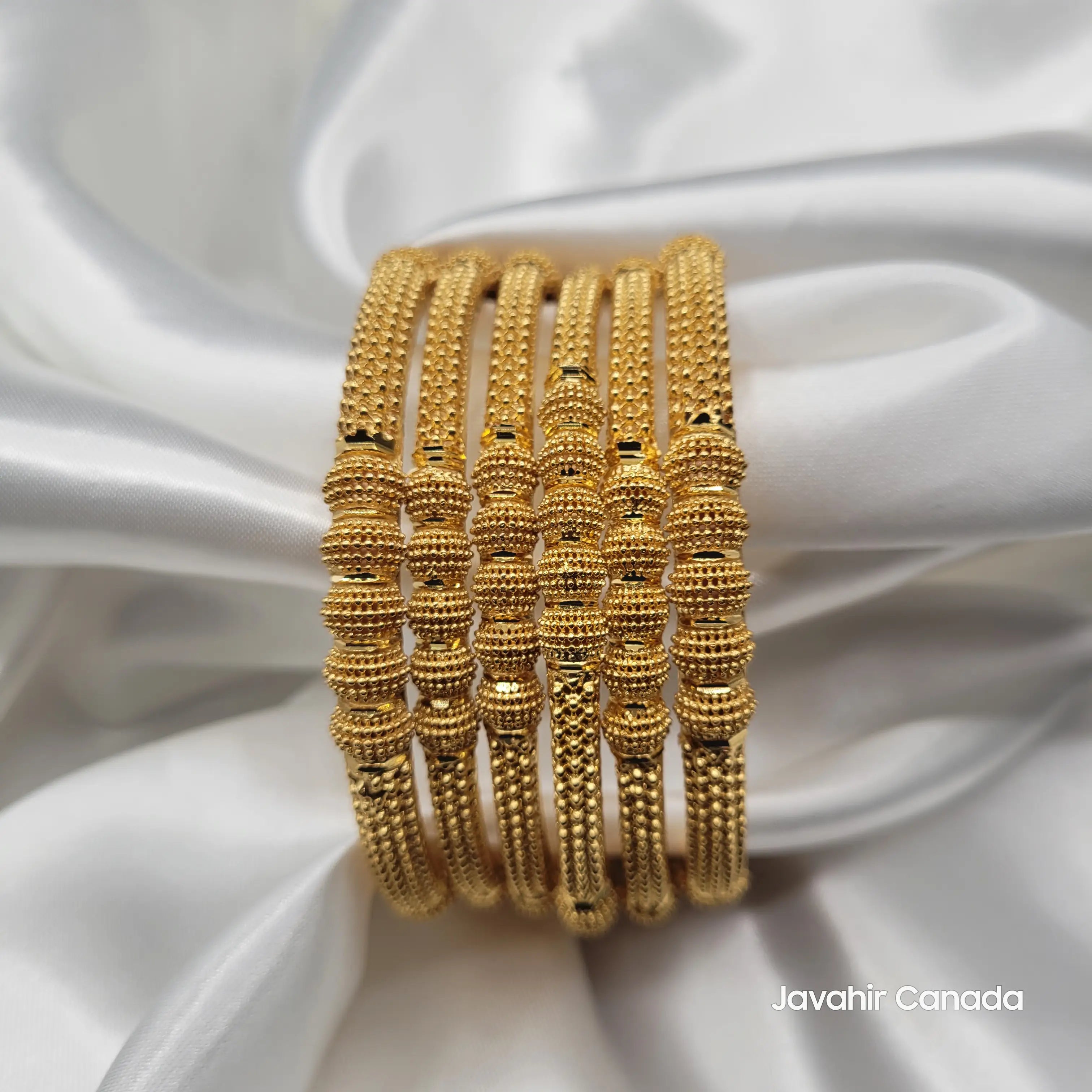Front view of textured 22K gold bangles – JV3037