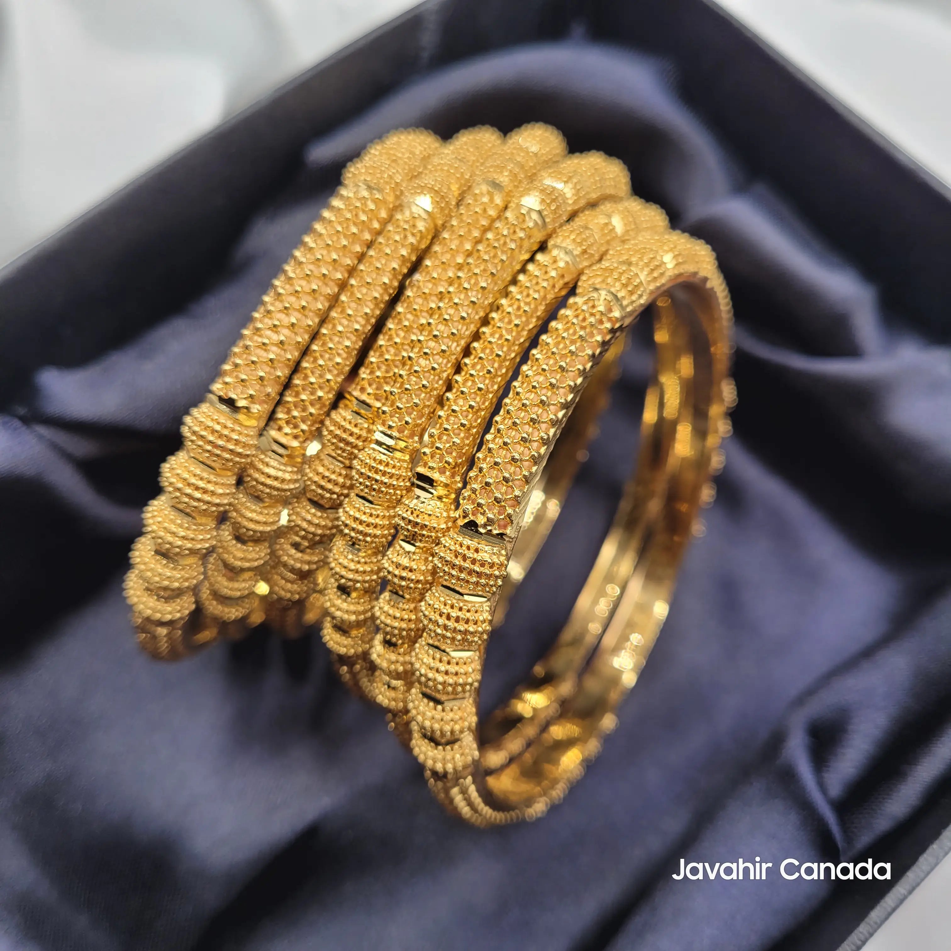 JV3037 bangles displayed in gift box – beaded gold design