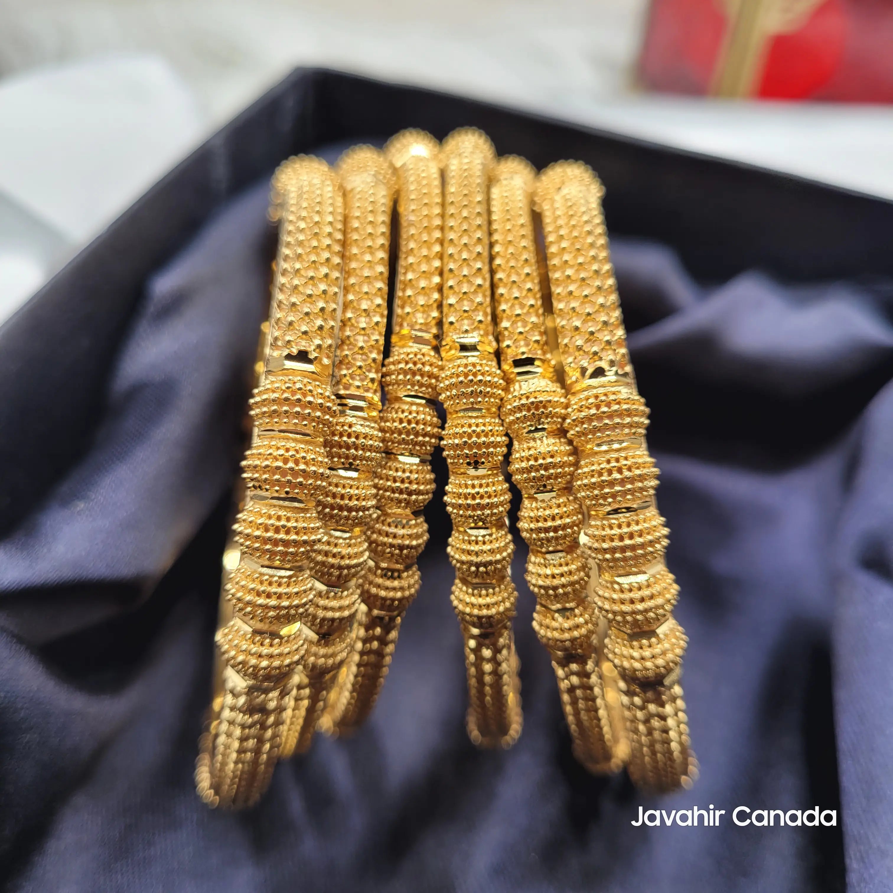 Close-up of handcrafted beaded bangles – JV3037 in box