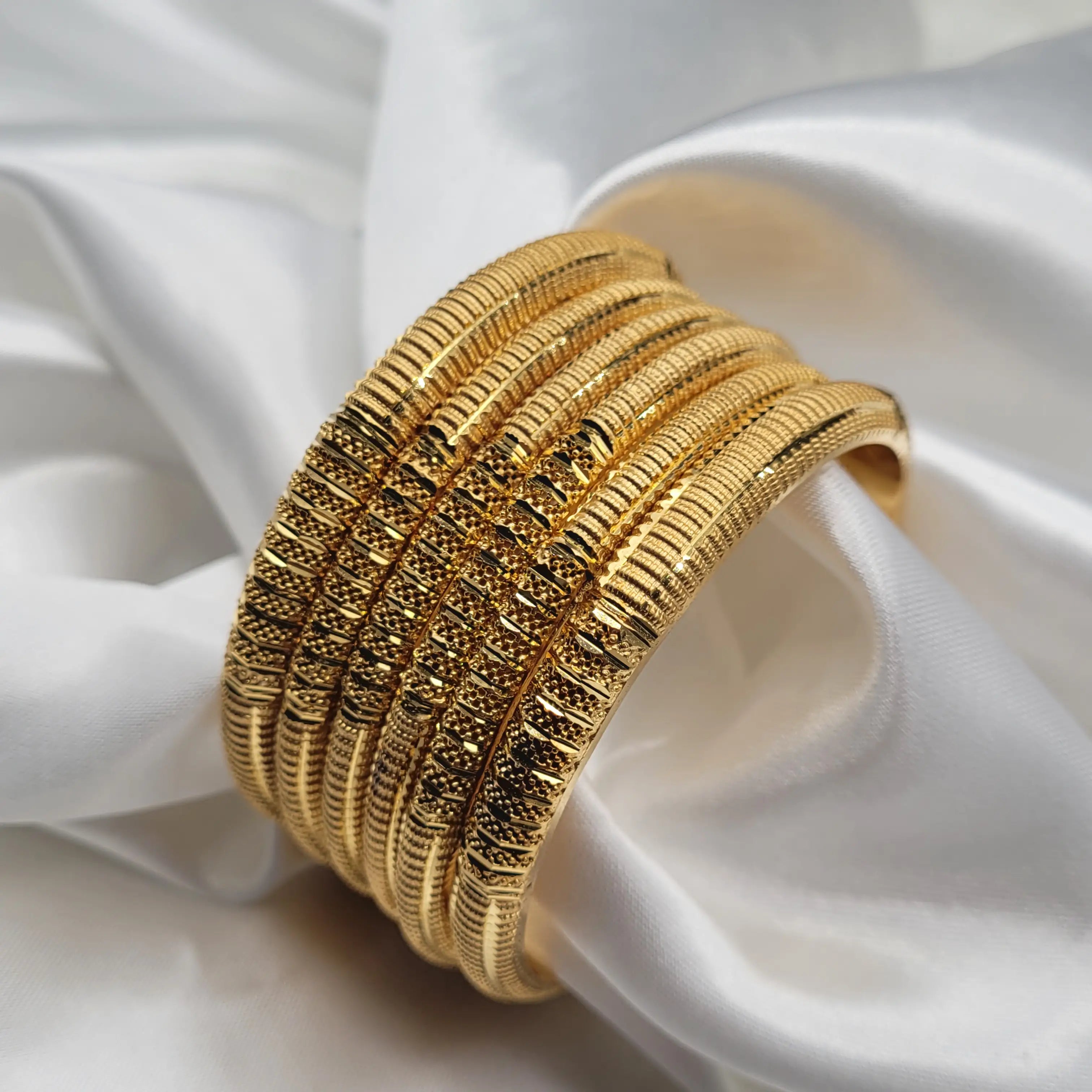 JV3038 gold plated bangles with engraved line design – set of 6