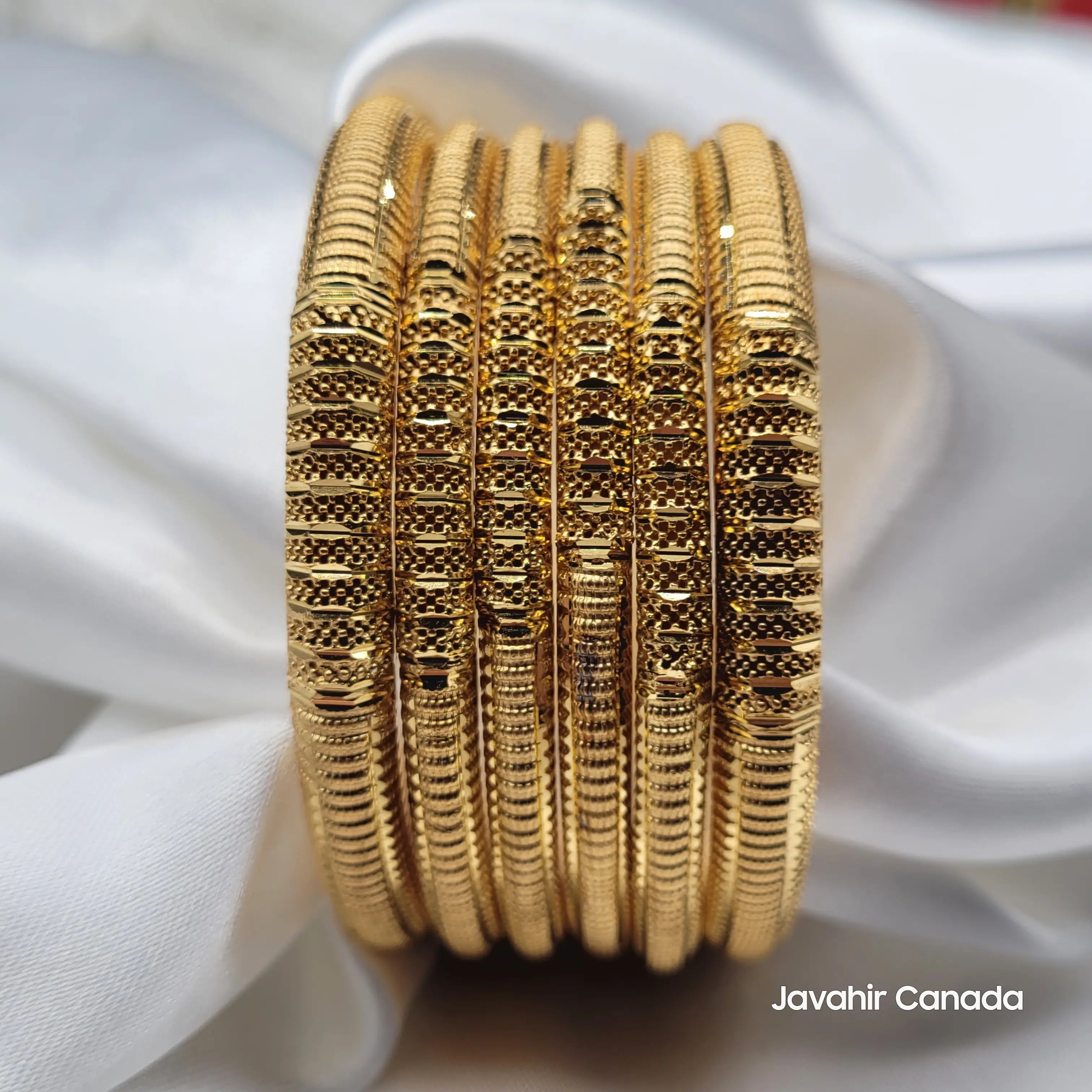 Front view of 22K gold bangles with detailed geometric texture – JV3038