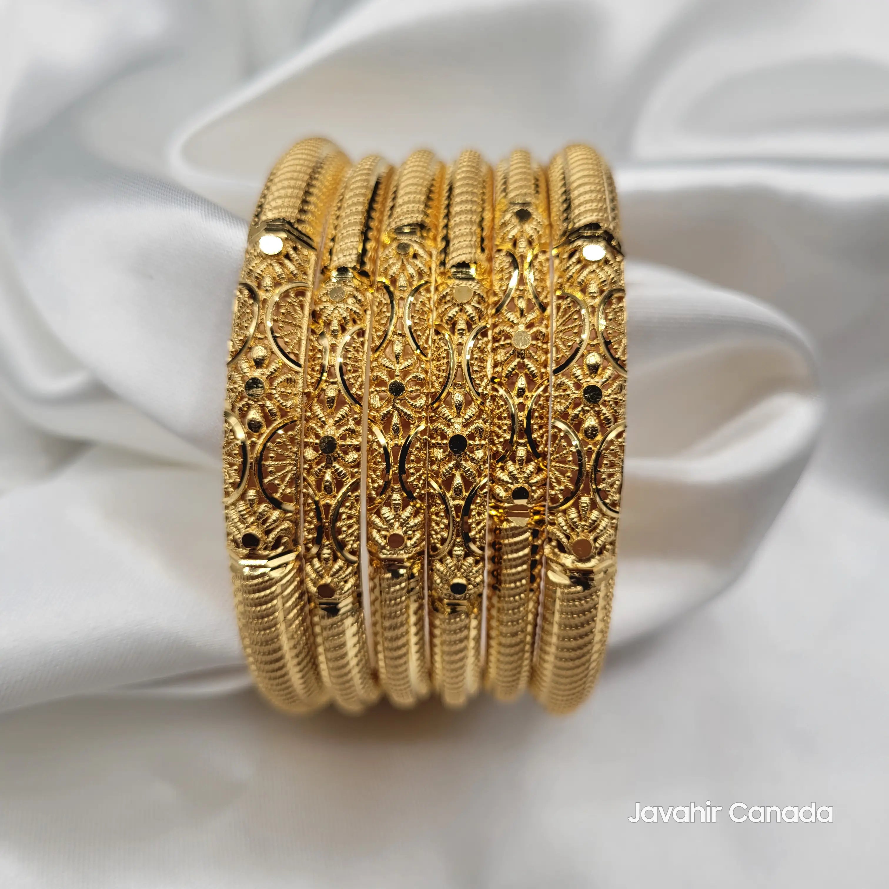 Close-up of crescent and floral filigree bangles – JV3039 traditional design