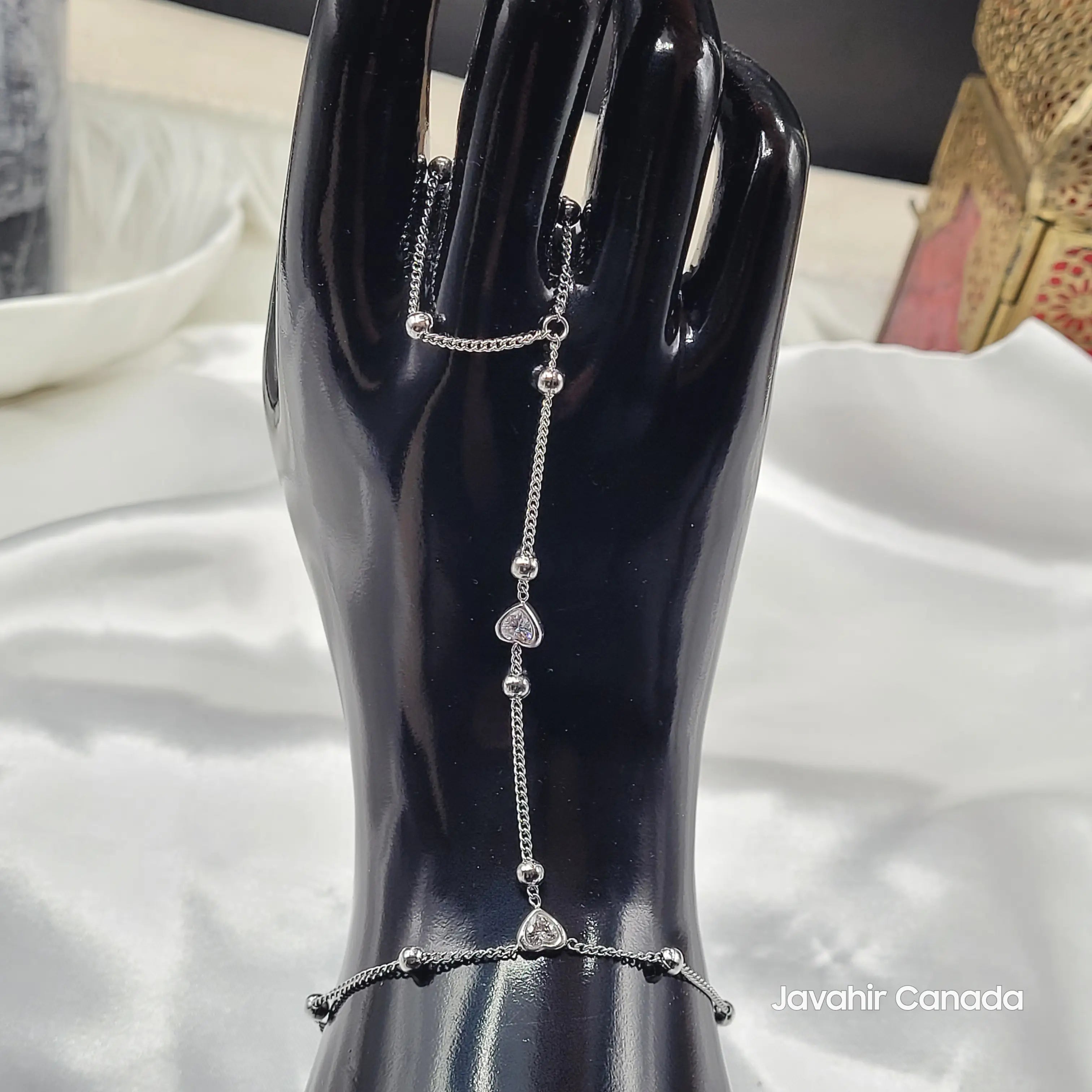 Full view of JV4022 silver Haath Phool with finger chain and wrist bracelet connection