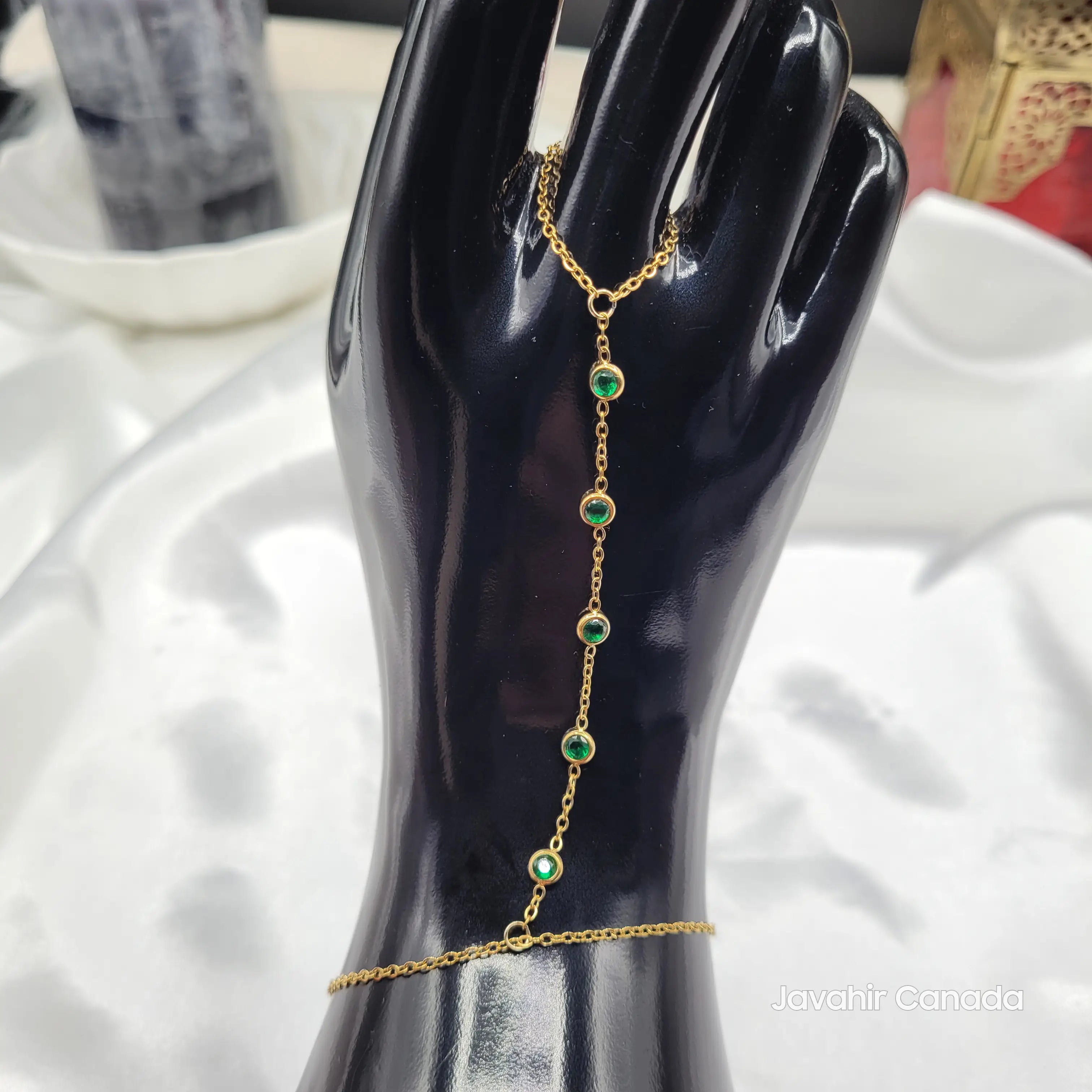 Gold chain with green crystals linked from ring to bracelet – JV4024