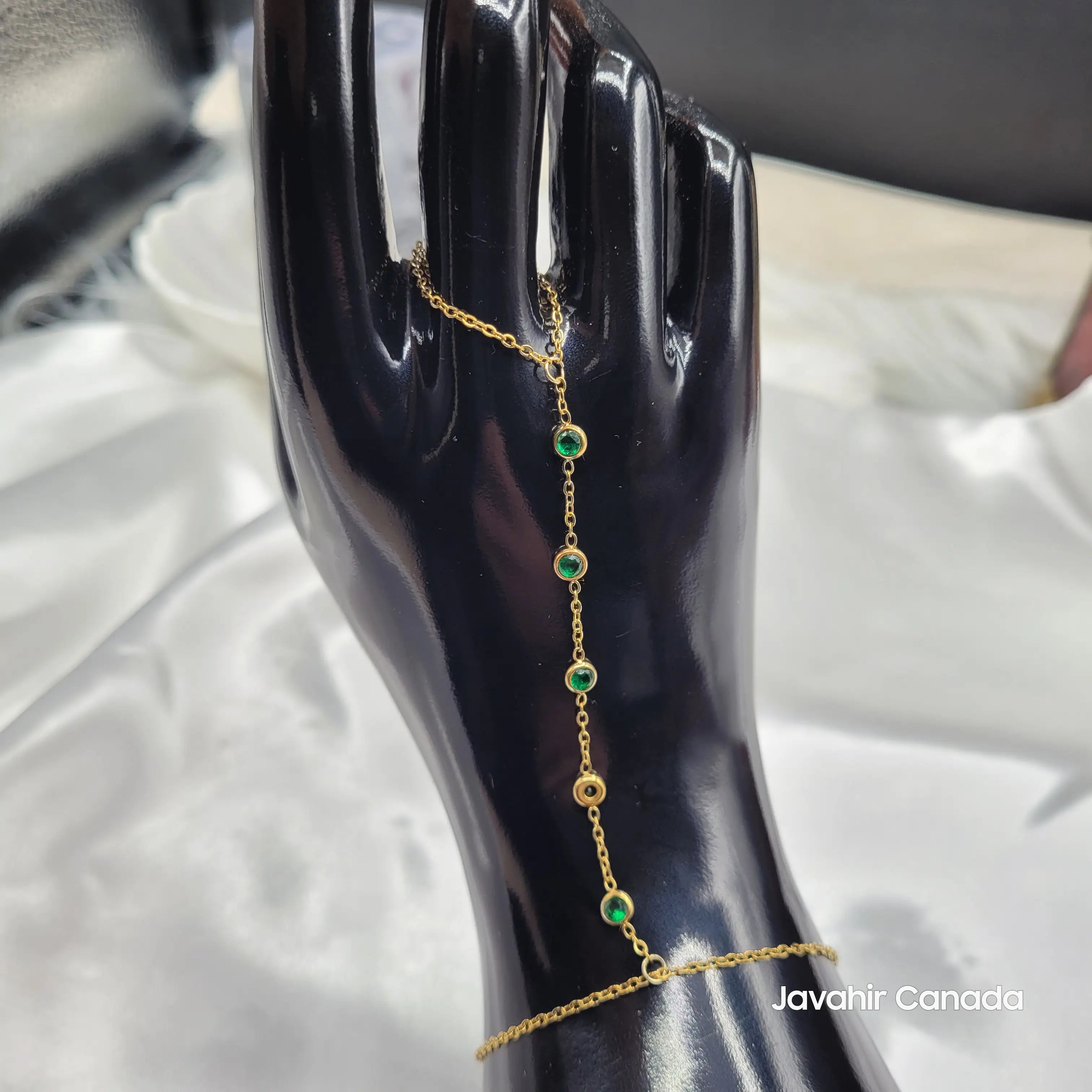 JV4024 Green Stone Hand Harness Bracelet on display stand