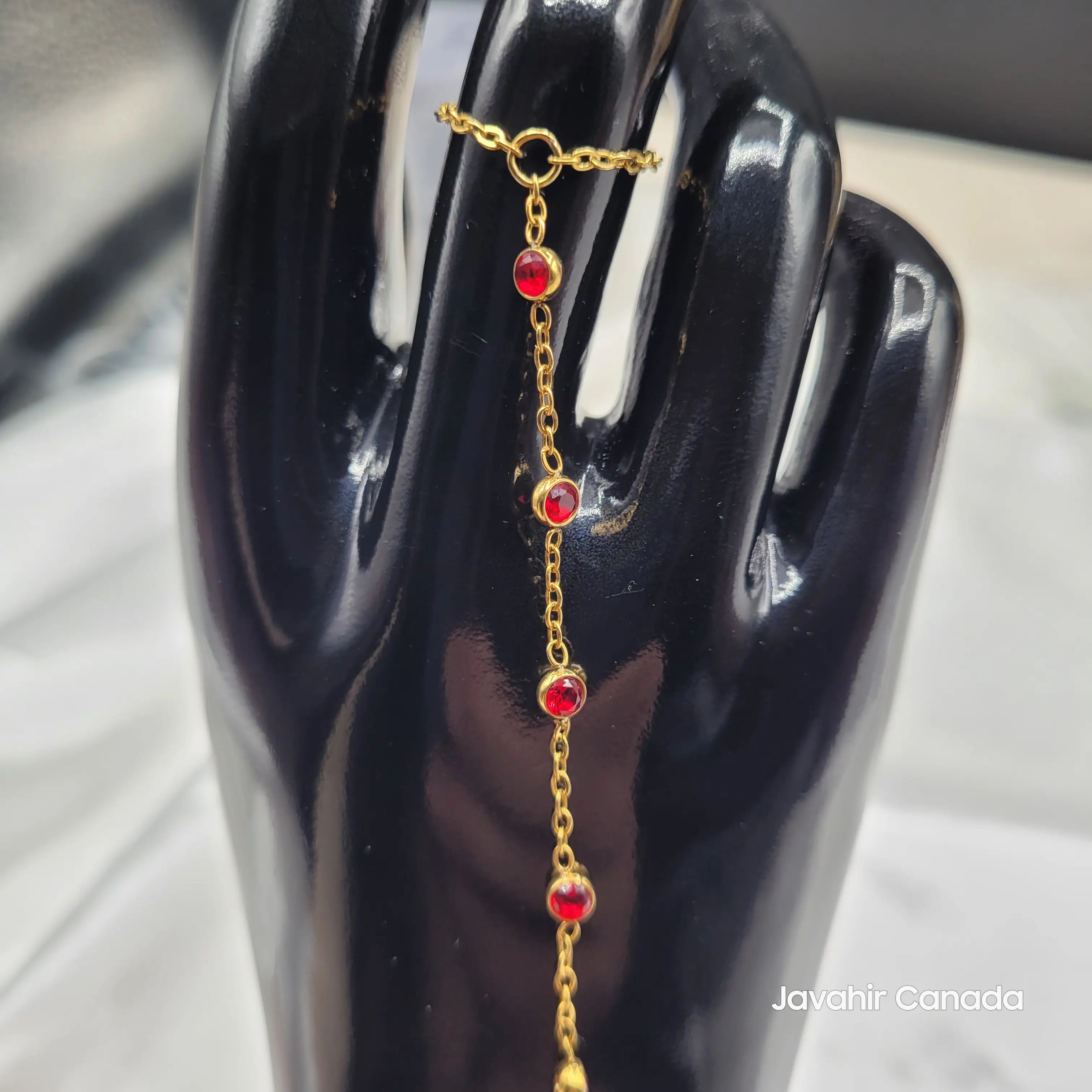 Close-up of JV4024 Red Stone gold-plated Haath Phool chain