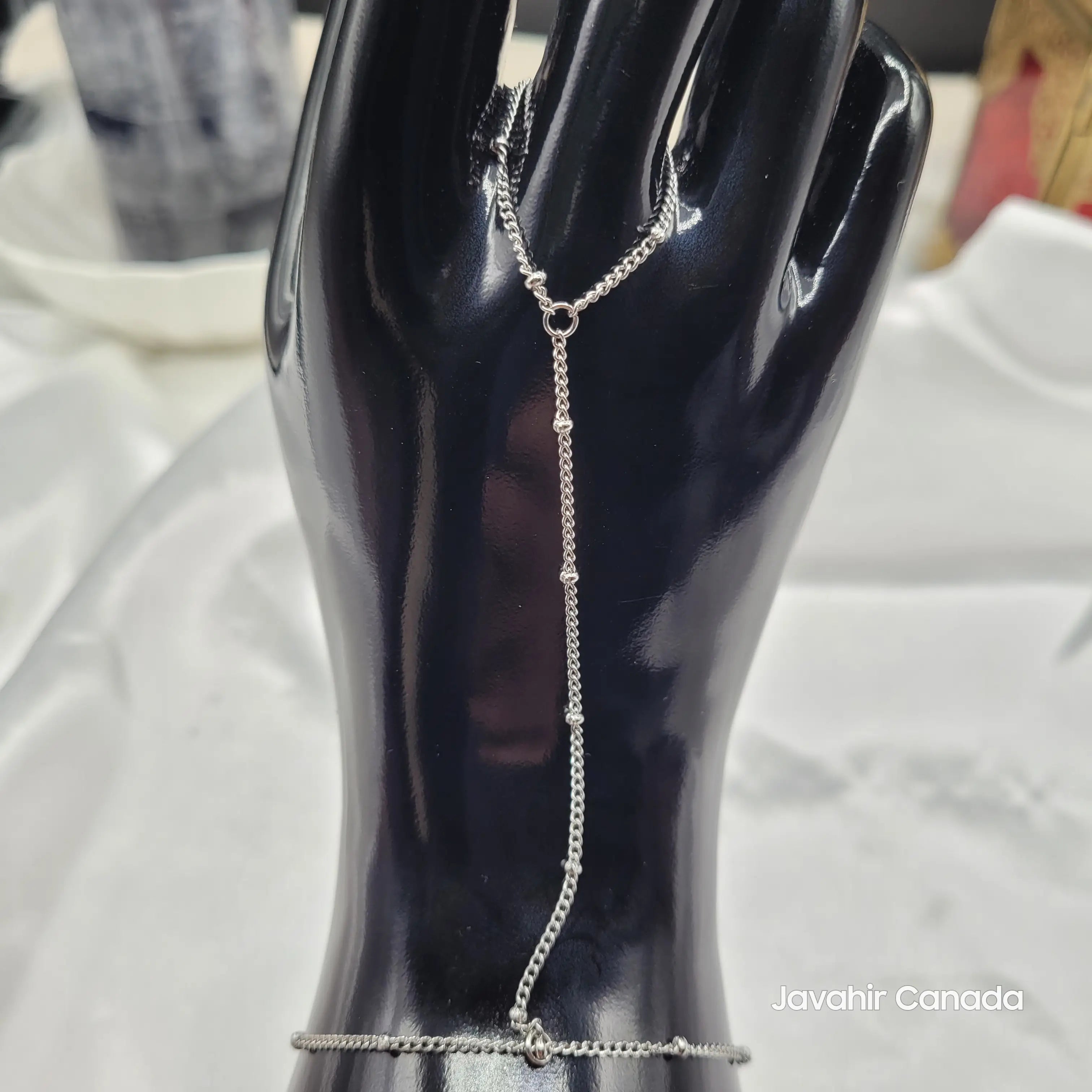 Close-up of silver beaded detail on JV4026 hand harness