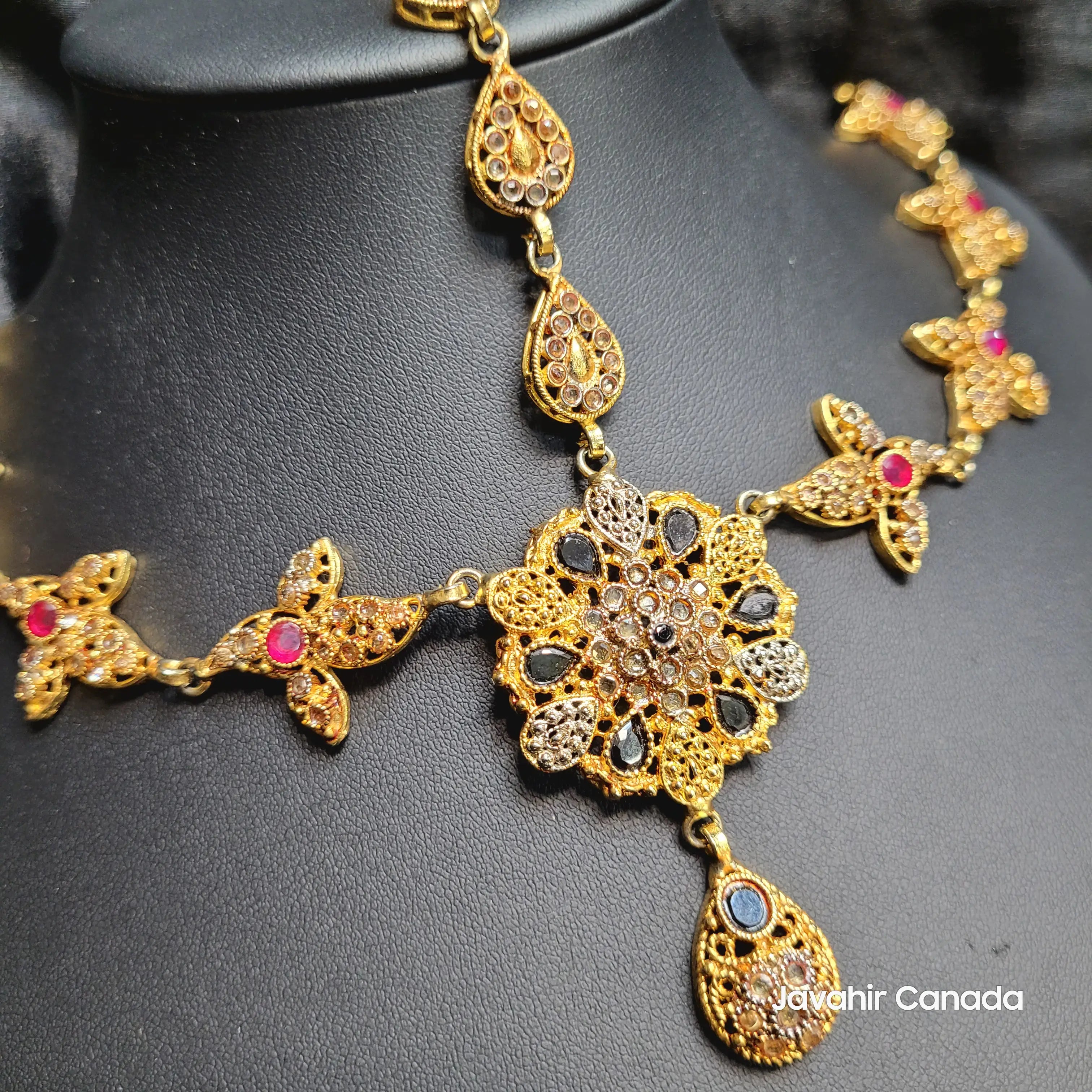 Side View of JV5122 Maatha Patti with Butterfly Motif and Pink Accents