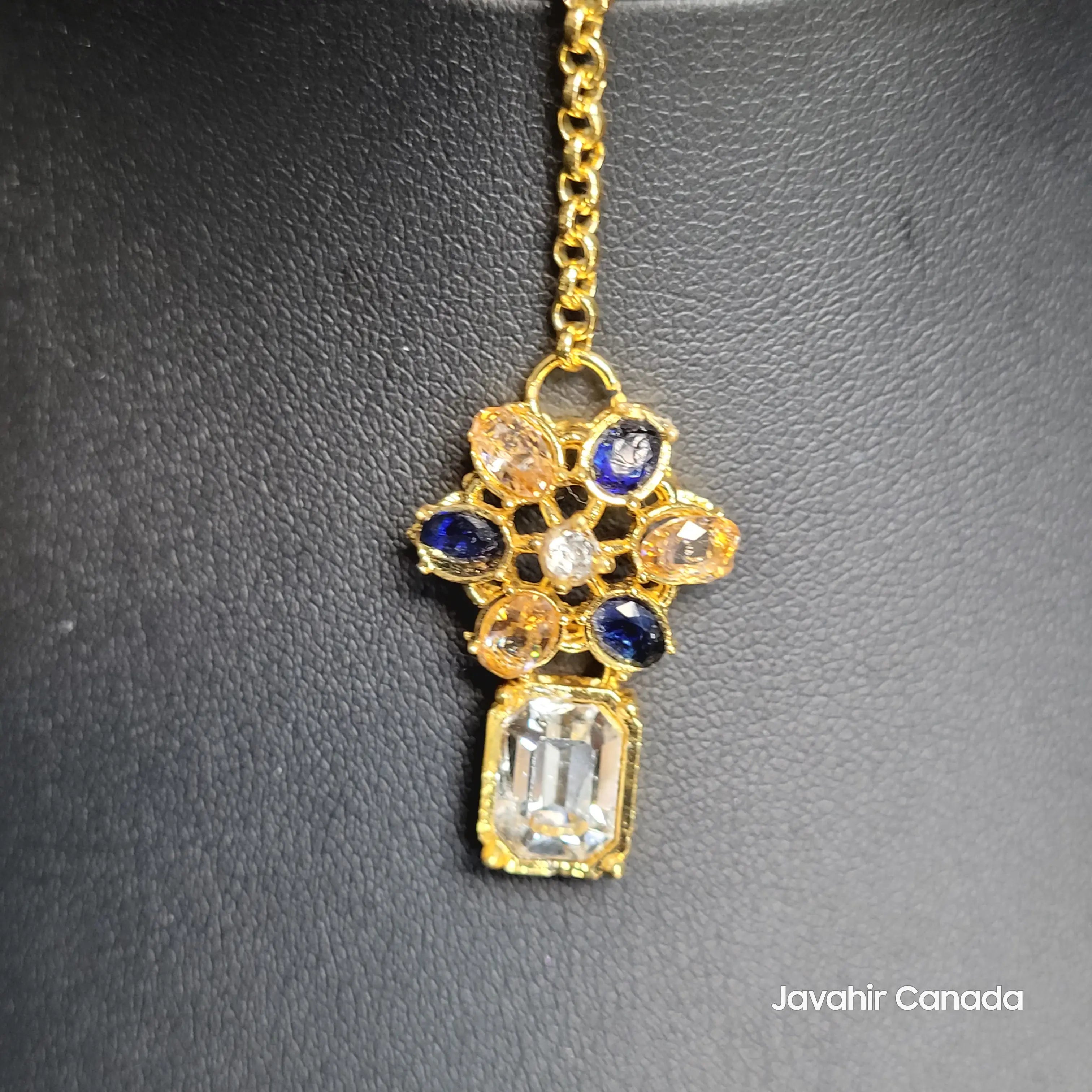 Traditional Teeka with large clear emerald-cut drop stone