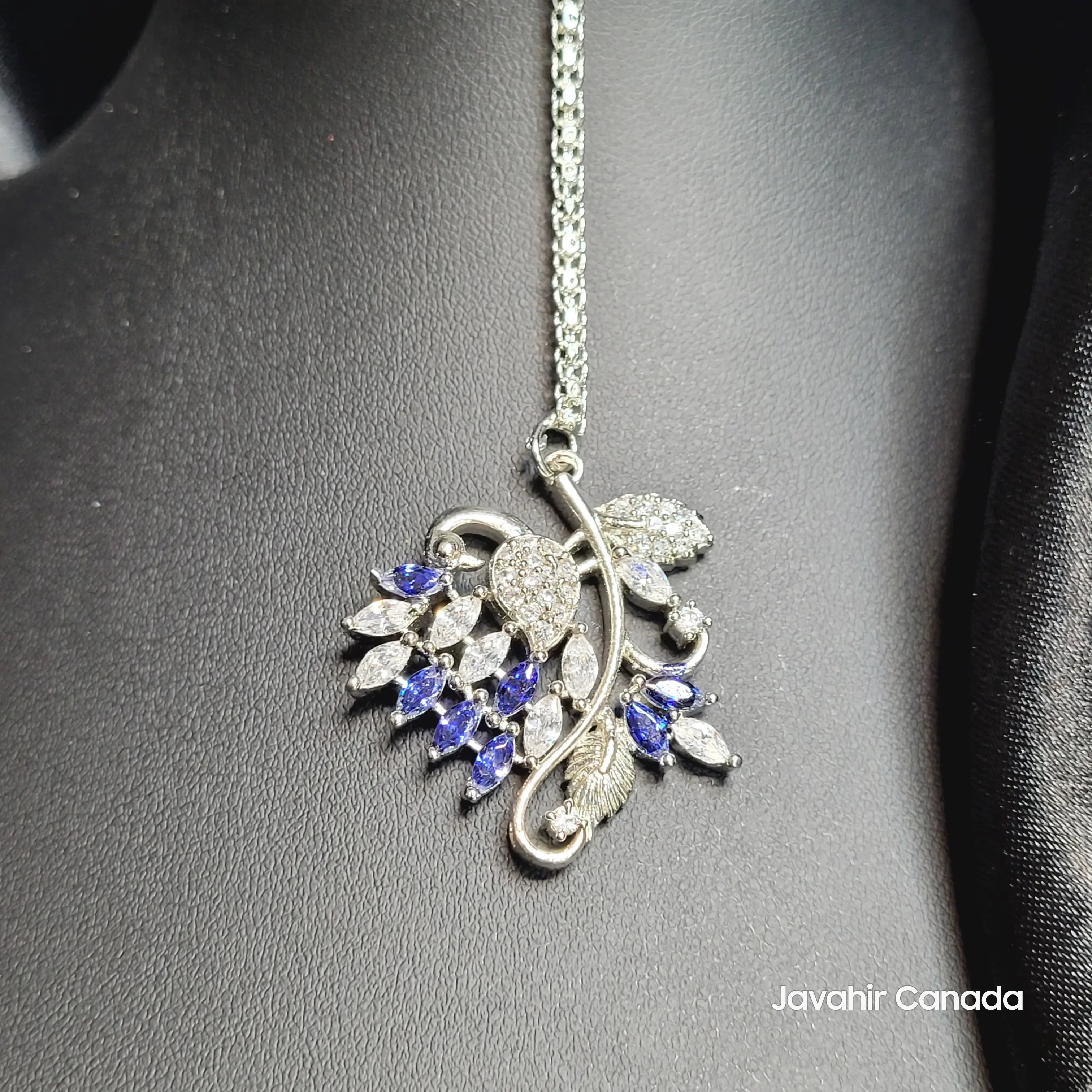 JV5208 leaf-shaped Teeka with blue and white stones