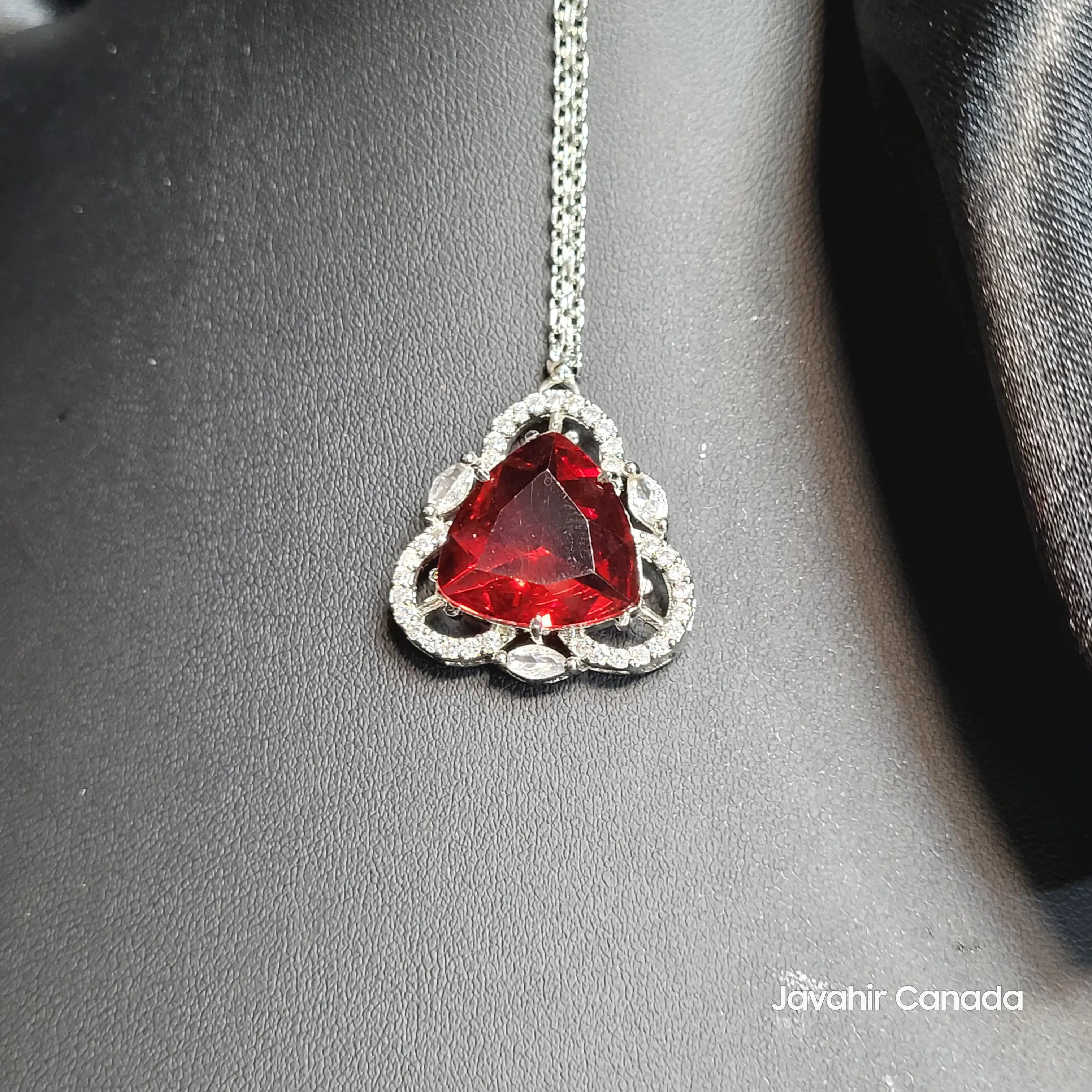 JV5211 Teeka with red trillion-cut gemstone