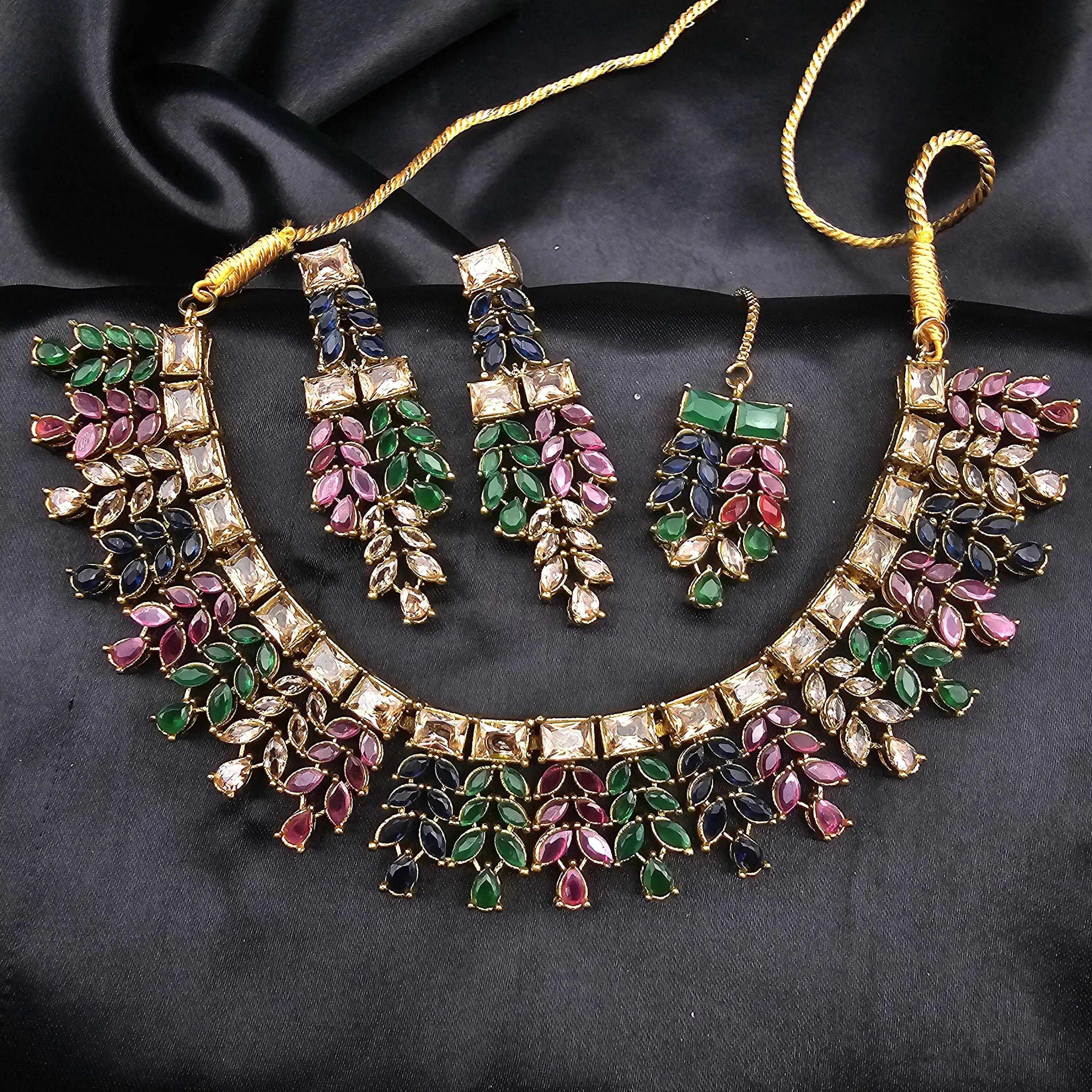 Alternate angle of Kaleidoscope necklace showing gold-plated chain and vibrant gemstone tones.