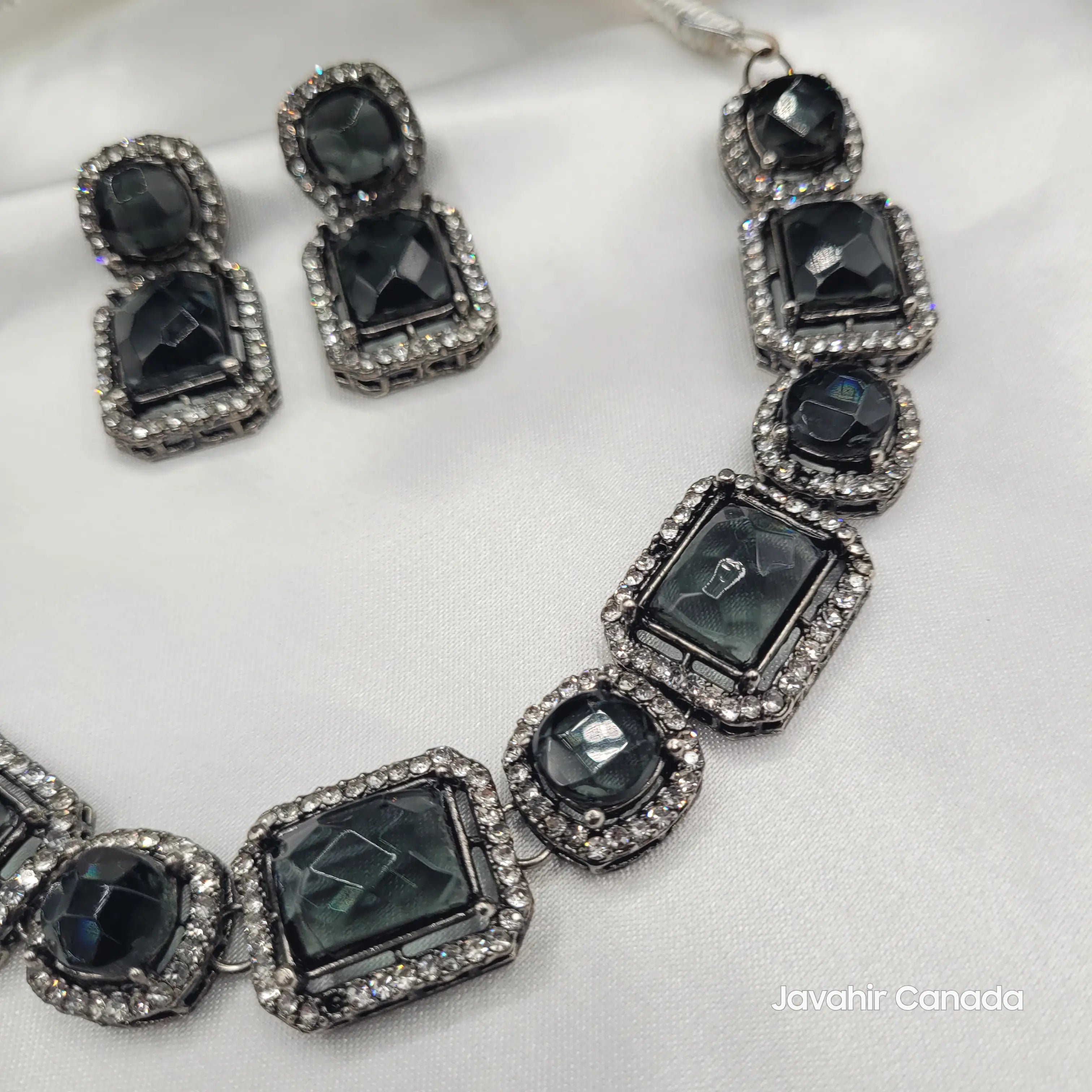 Side view of Maharaj black necklace and earring set showing rectangular gemstone layout