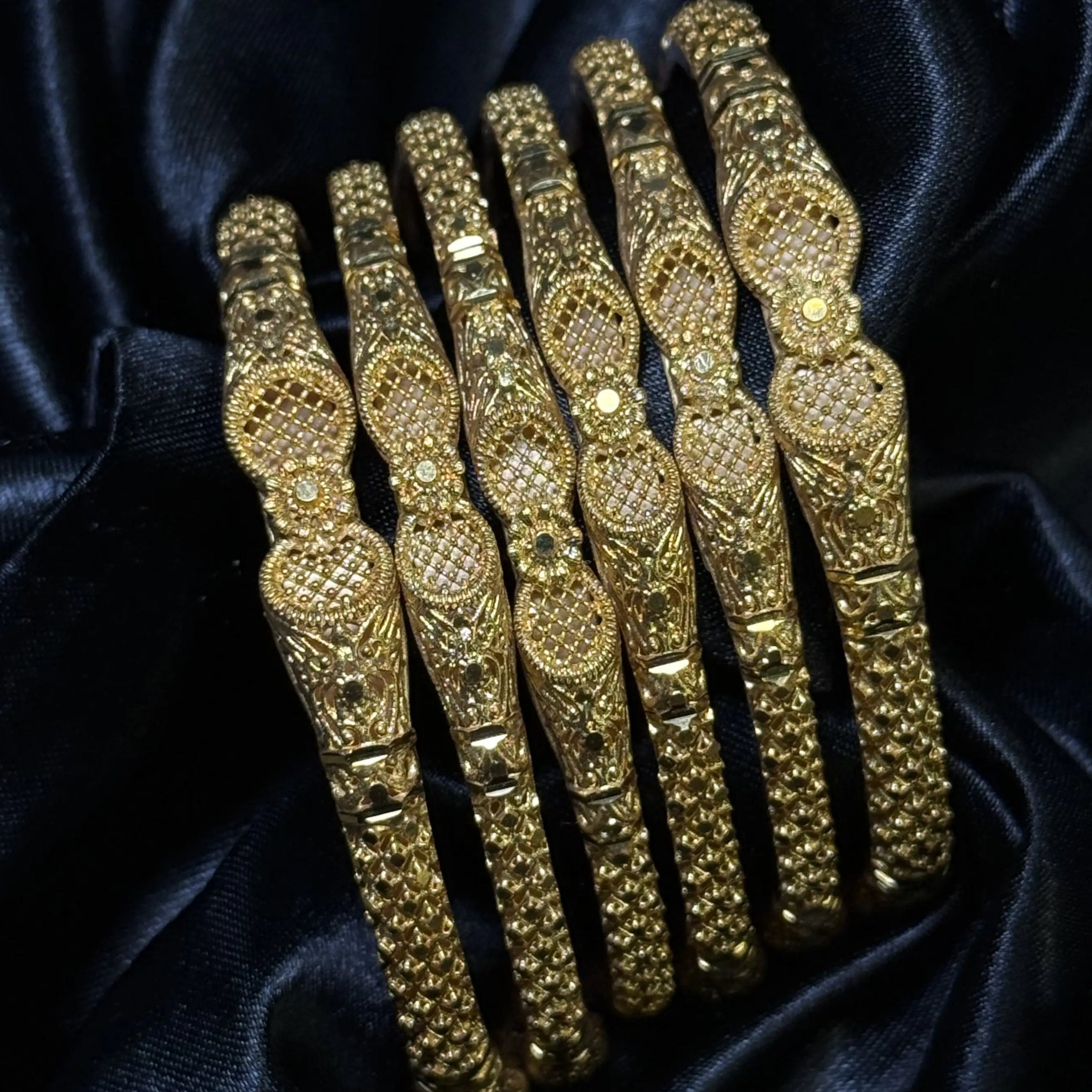 Solid gold-colored bangles with traditional embossed design. Best seller gold-plated bridal bangles – Pakistani jewelry set