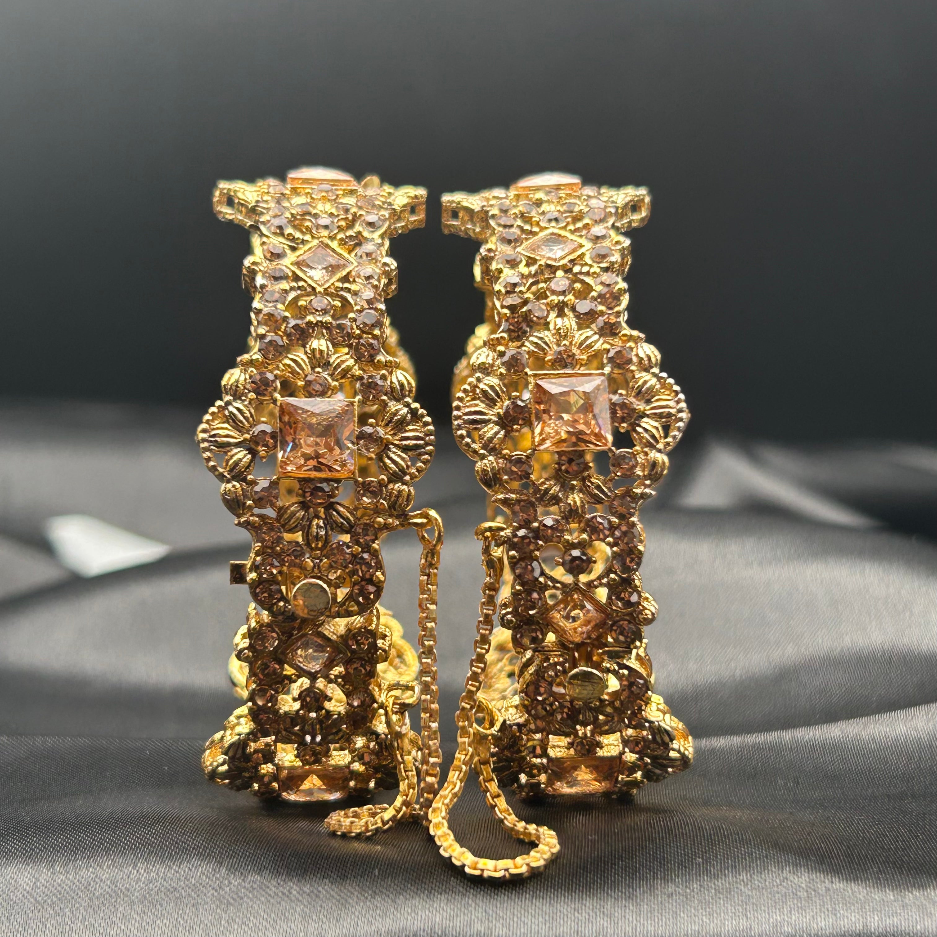Front view of Ancient bangles with champagne stones and gold detailing