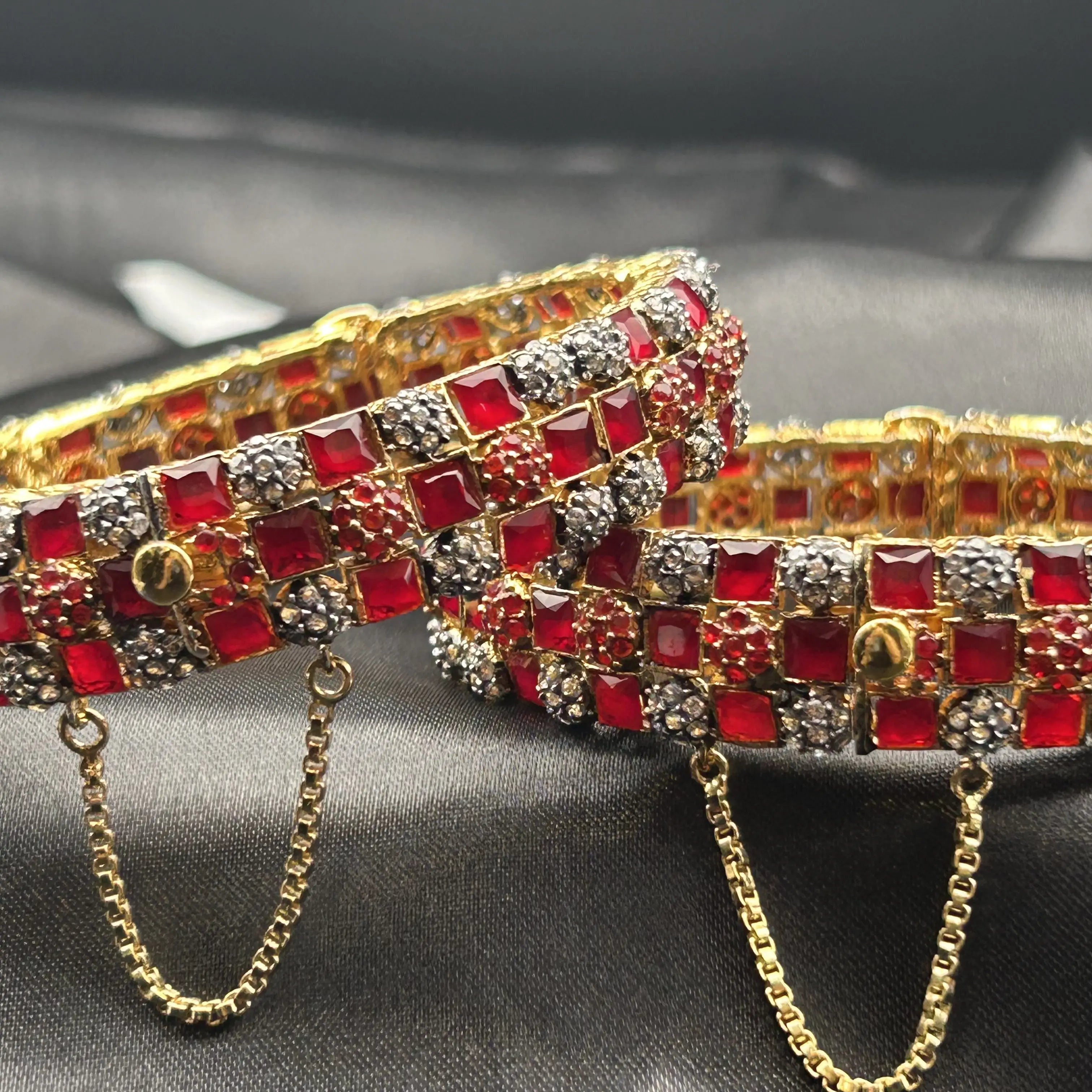 Braided Bangles – grid-style ruby red bridal bangles with chain – side view