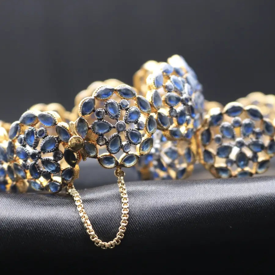 Floral patterned blue bangles with gold base – side view