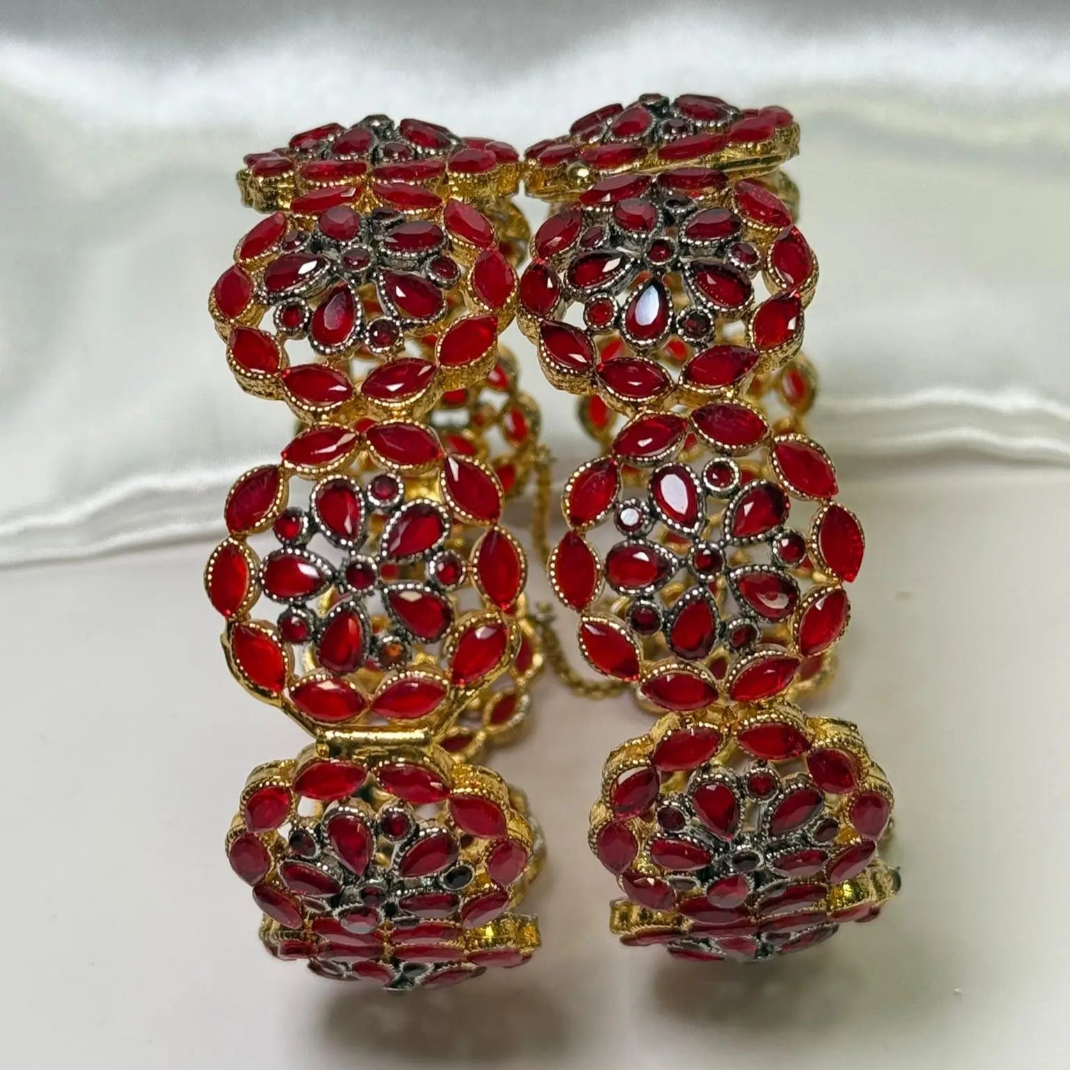 Celestial bangles in red with floral CZ design – front view
