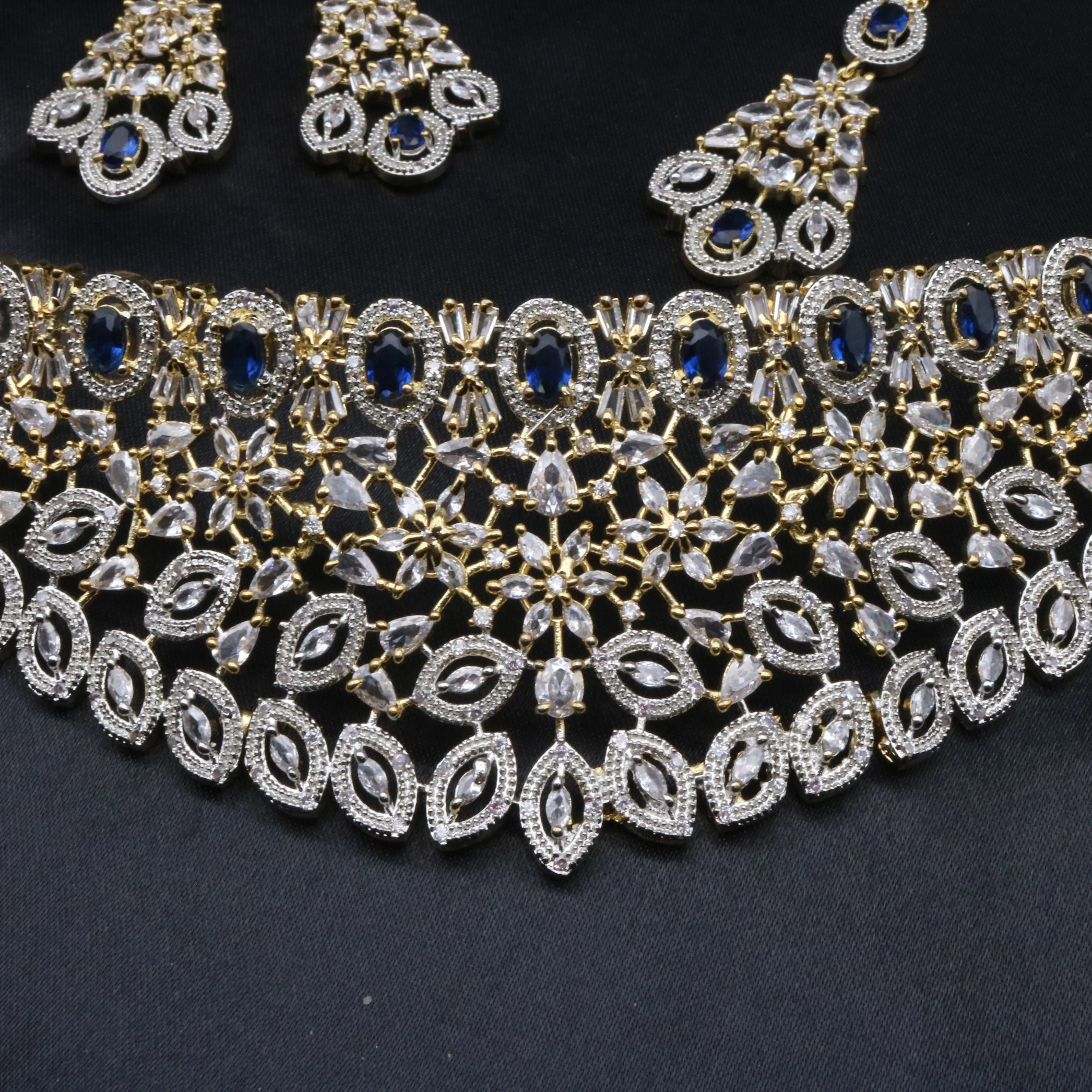 Close-up of the blue Fairy choker with sapphire-toned stones and floral CZ detailing.