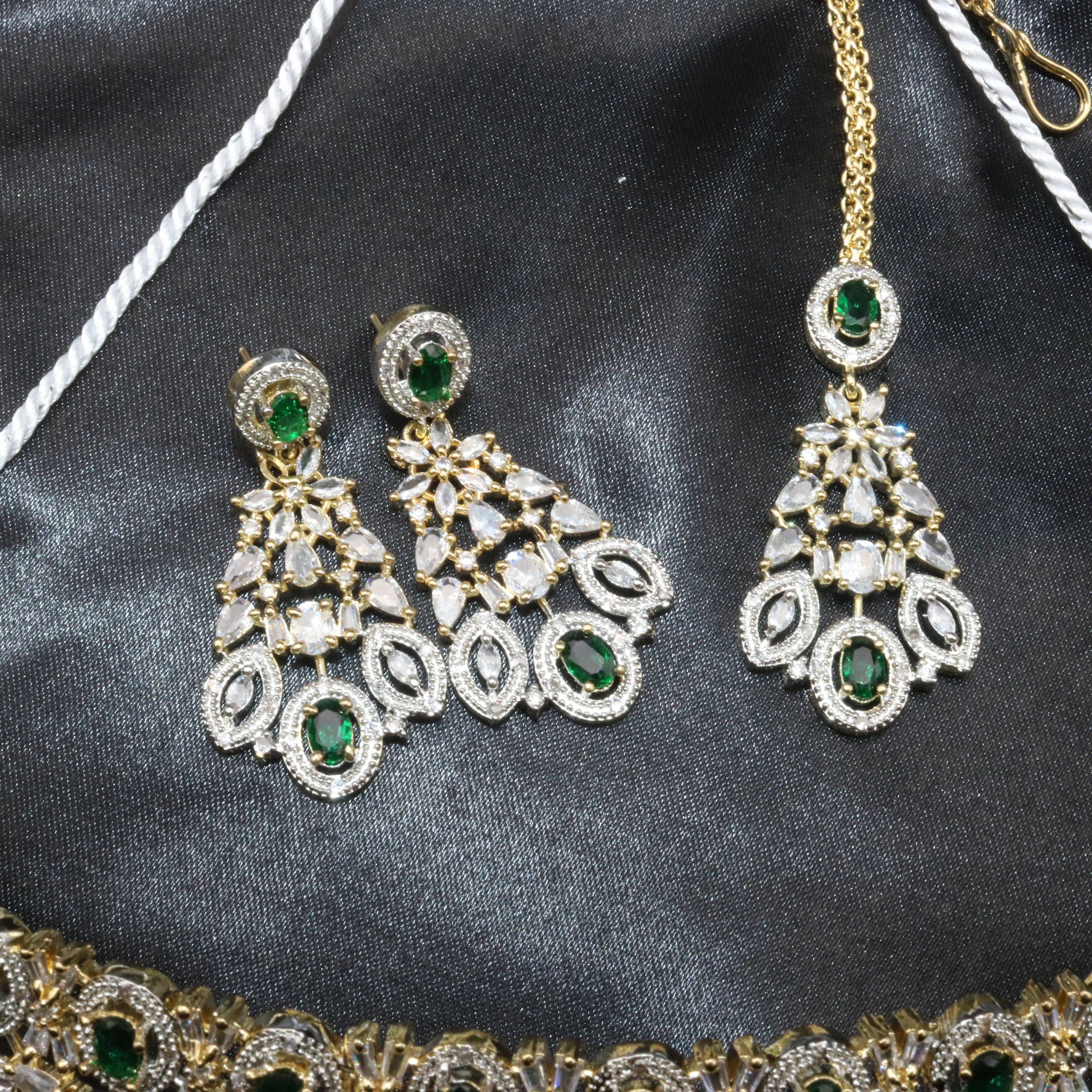 Matching green earrings and teeka with marquise and pear-shaped CZ stones, part of the Fairy necklace set.