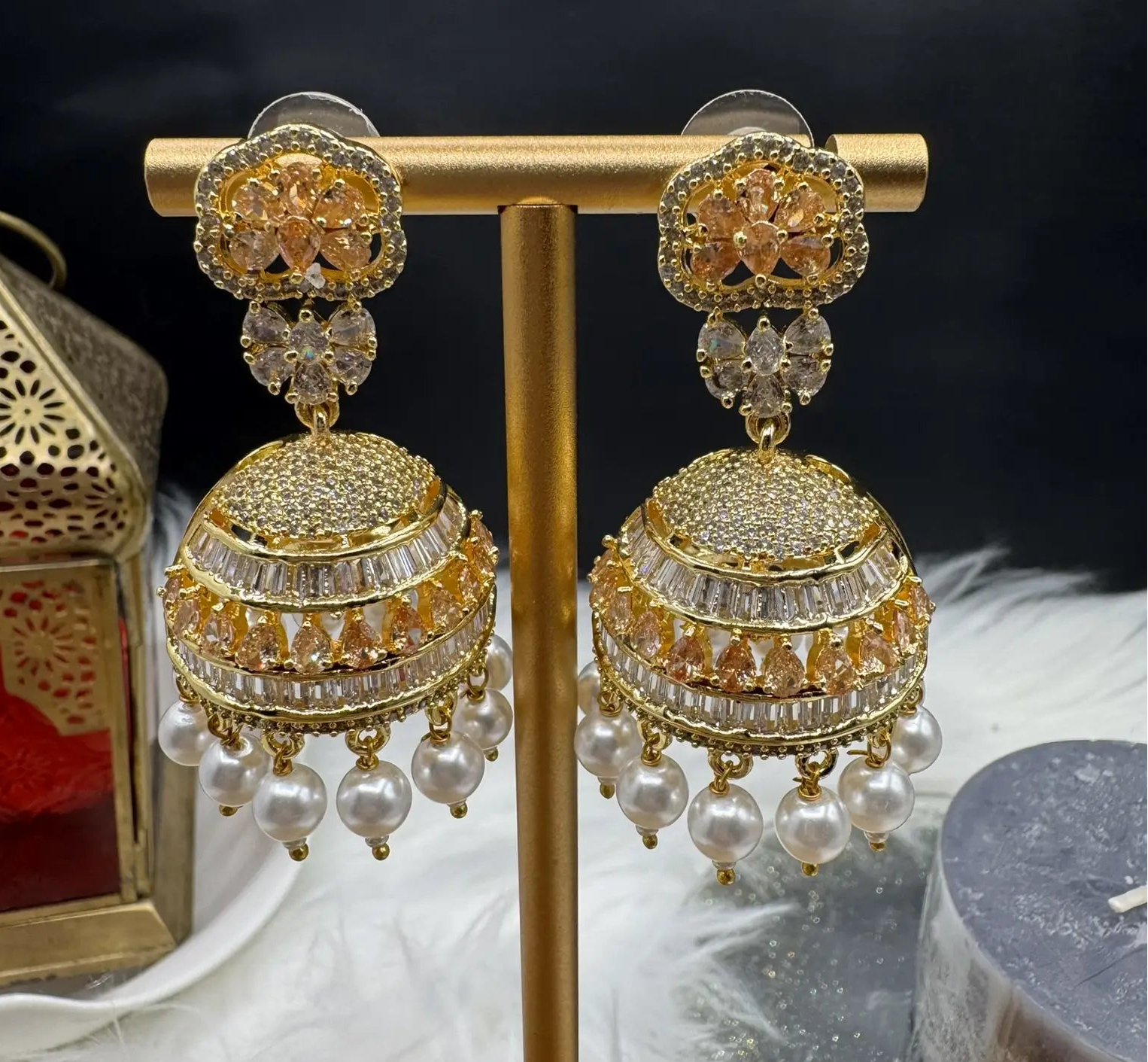 Pakistani design intricate Jhumka with nano zarcon and jarao craftsmanship. They are gold plated and waterproof.