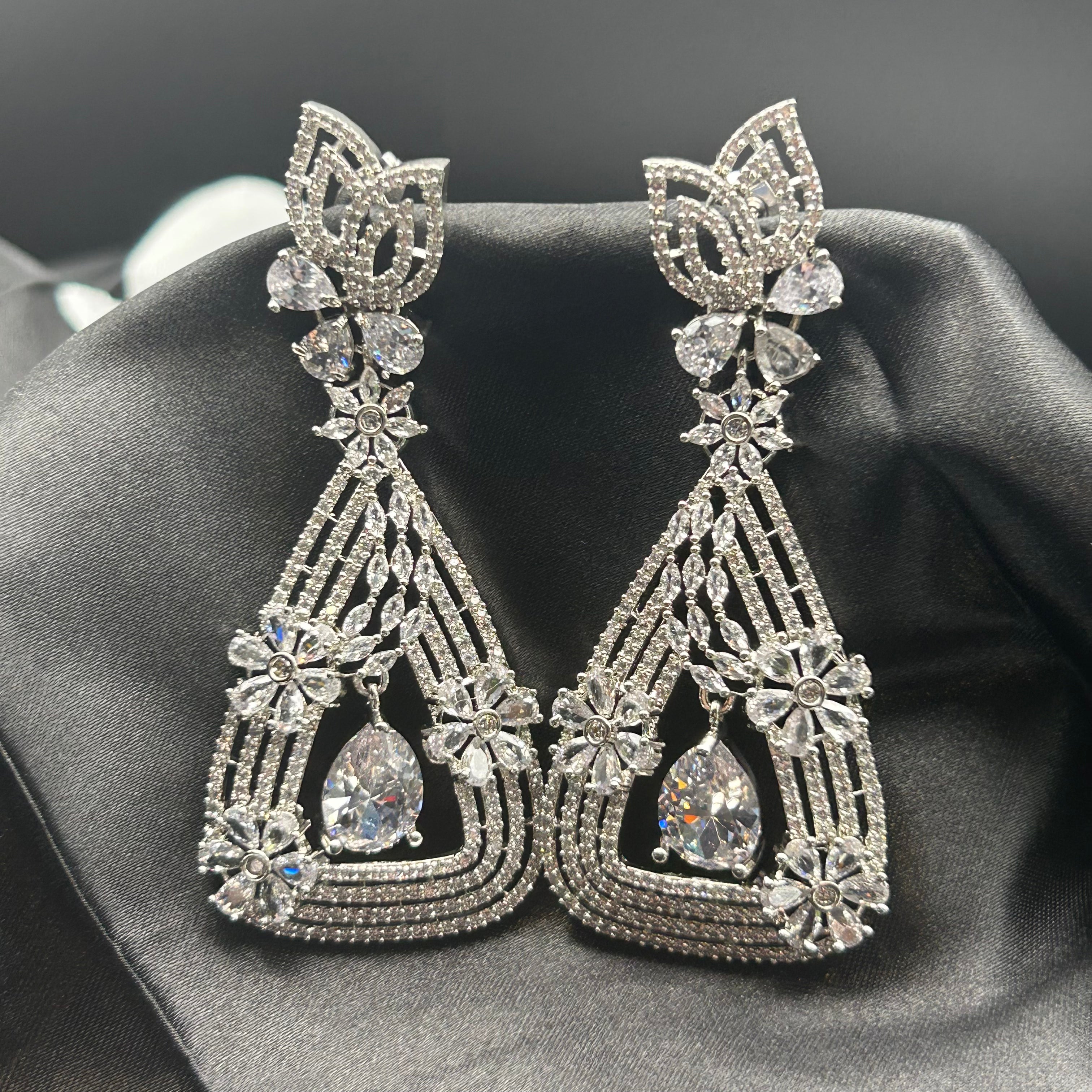 American Diamond Statement Earrings on a black background