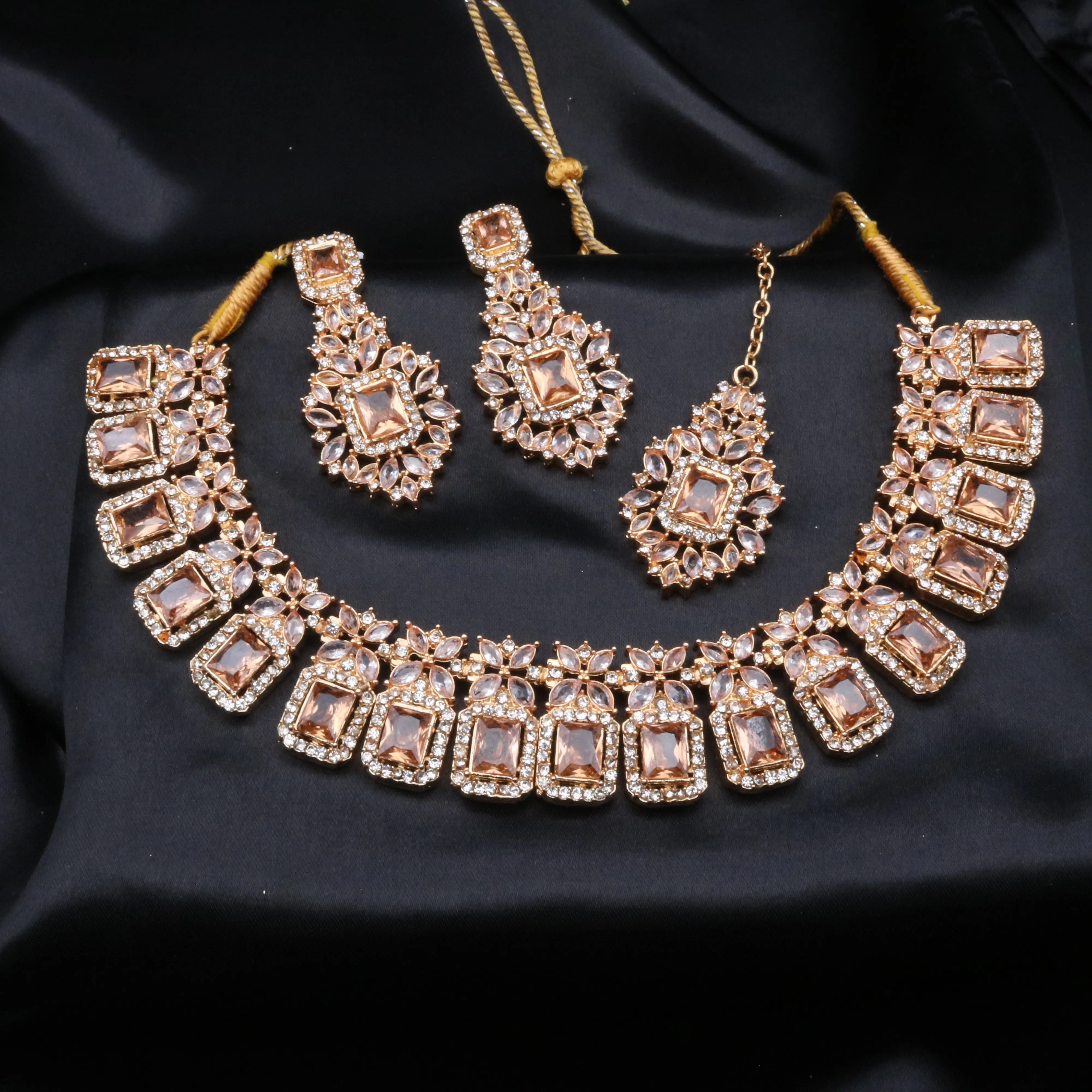 Pascal champagne necklace set with rectangular CZ stones and teeka in gold finish