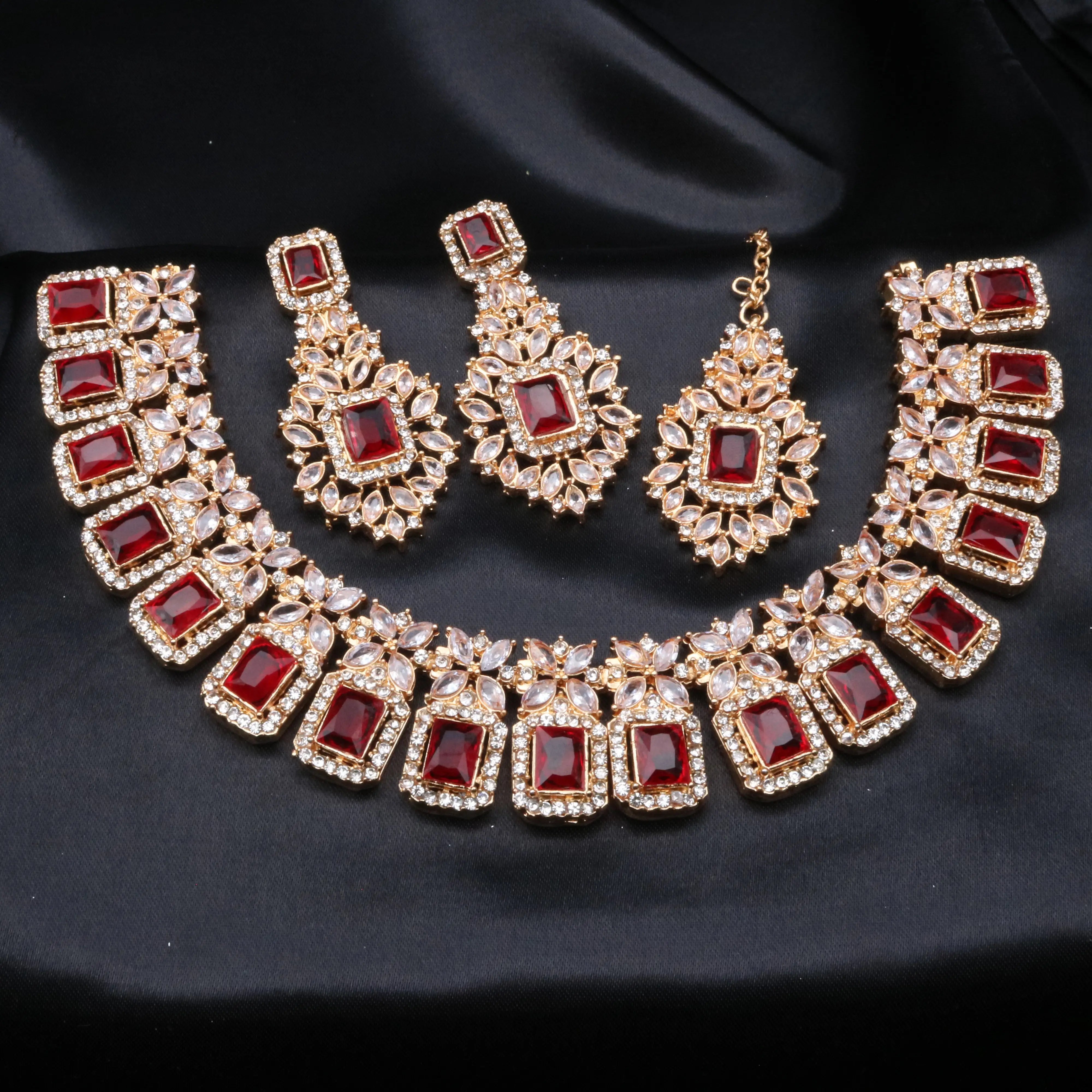 Full ruby red Pascal set in gold finish with American diamond accents