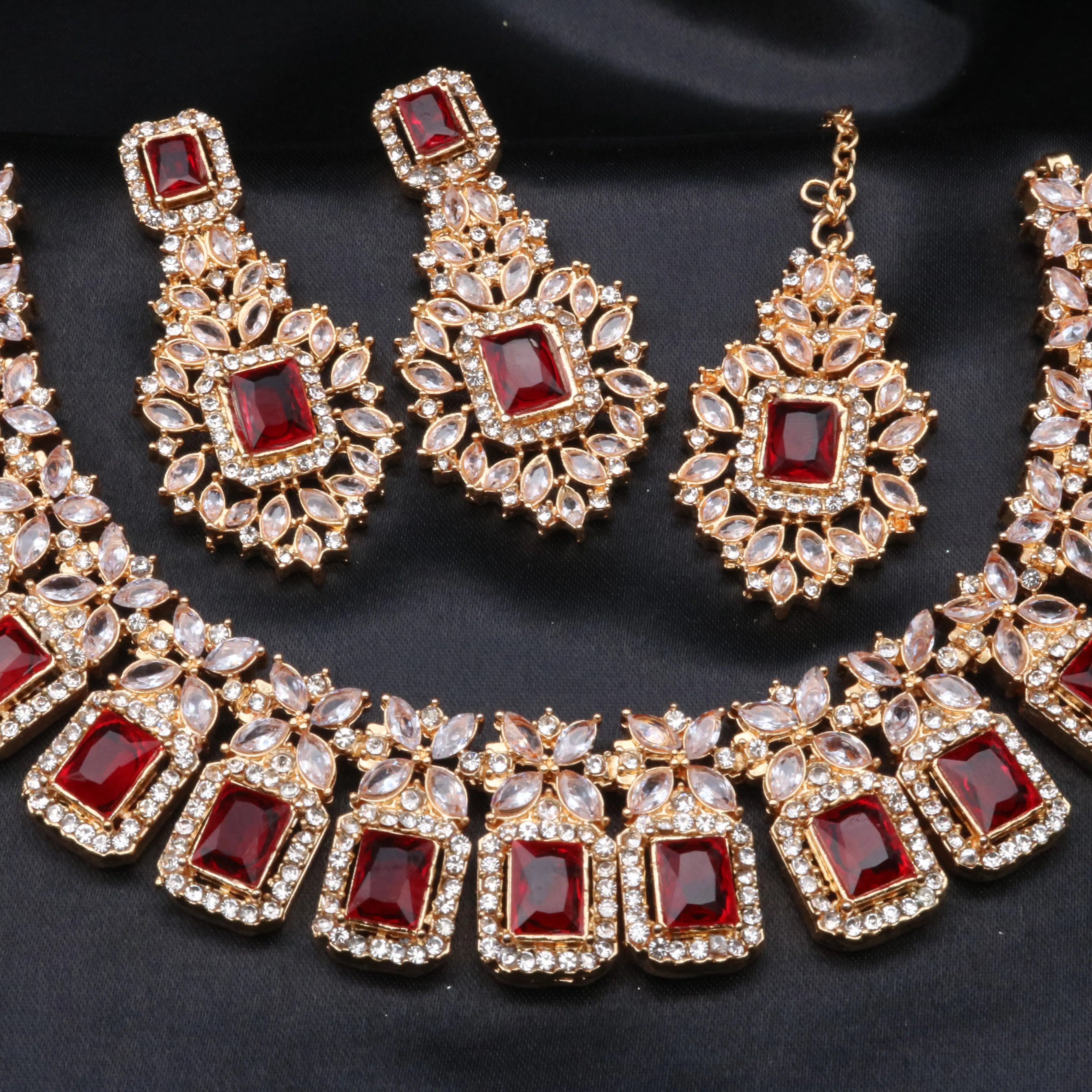 Pascal ruby red necklace and earrings with deep red CZ stones and floral detailing