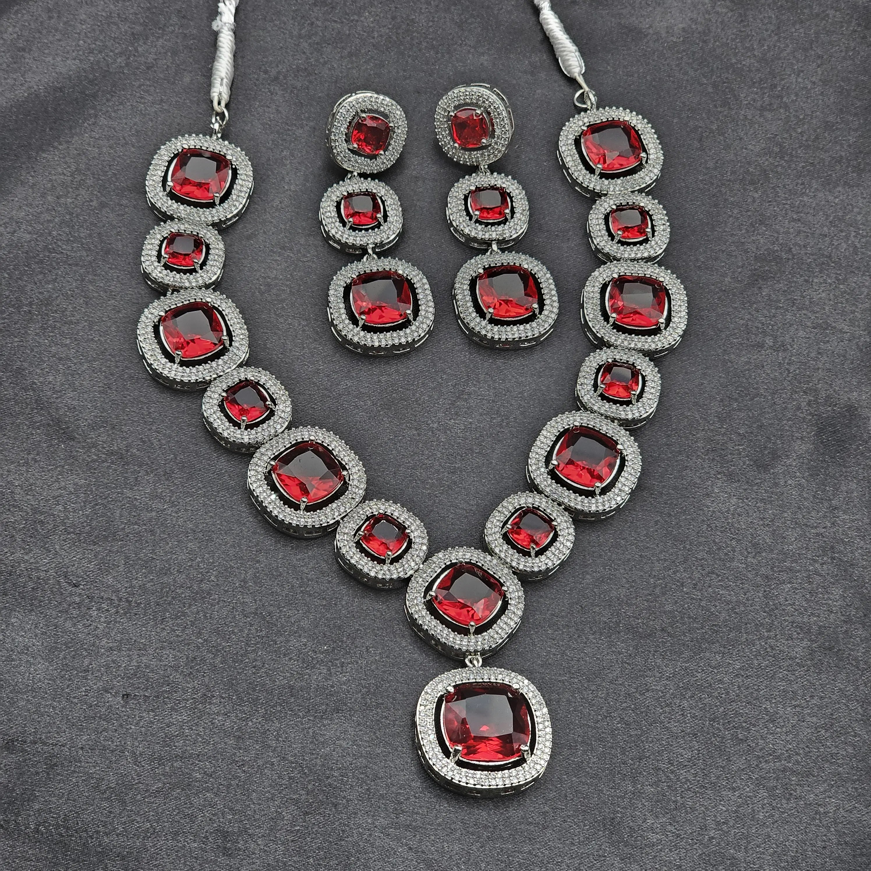 Pixie red necklace set with matching earrings on silver rhodium-plated base