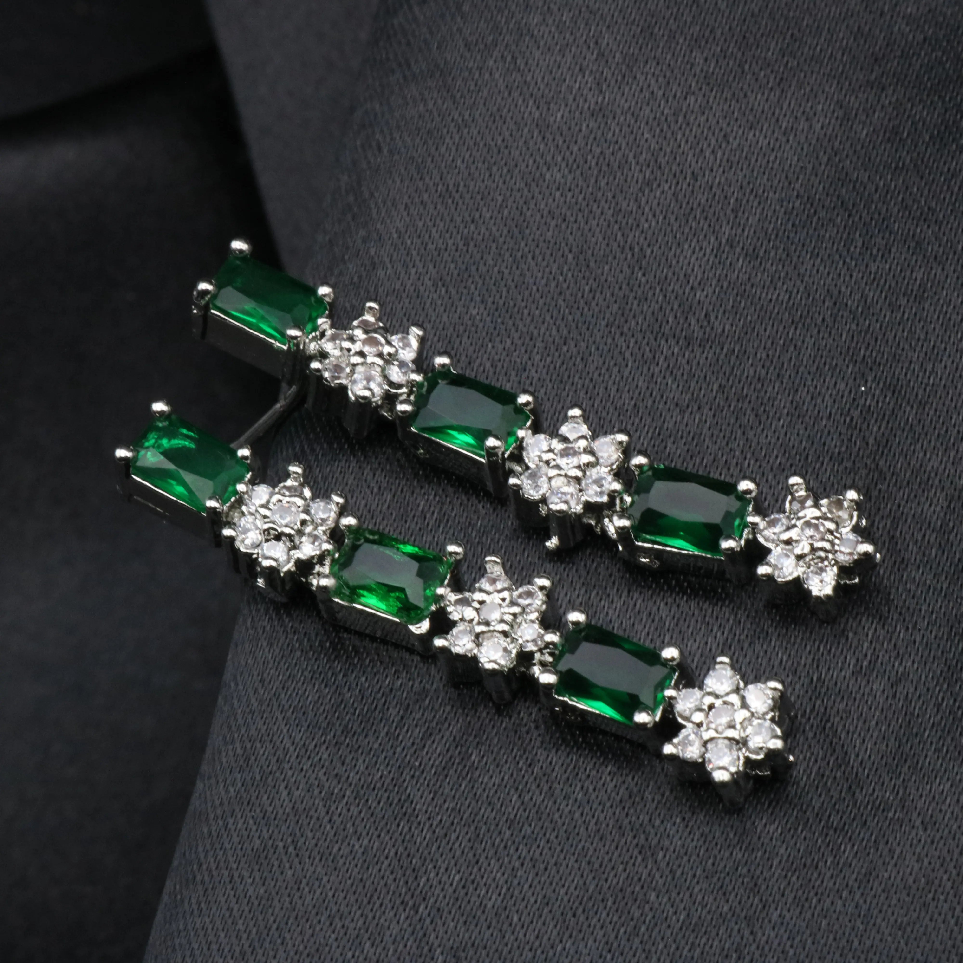 Emerald green gemstone CZ earrings with American diamond accents from Reverie jewelry set