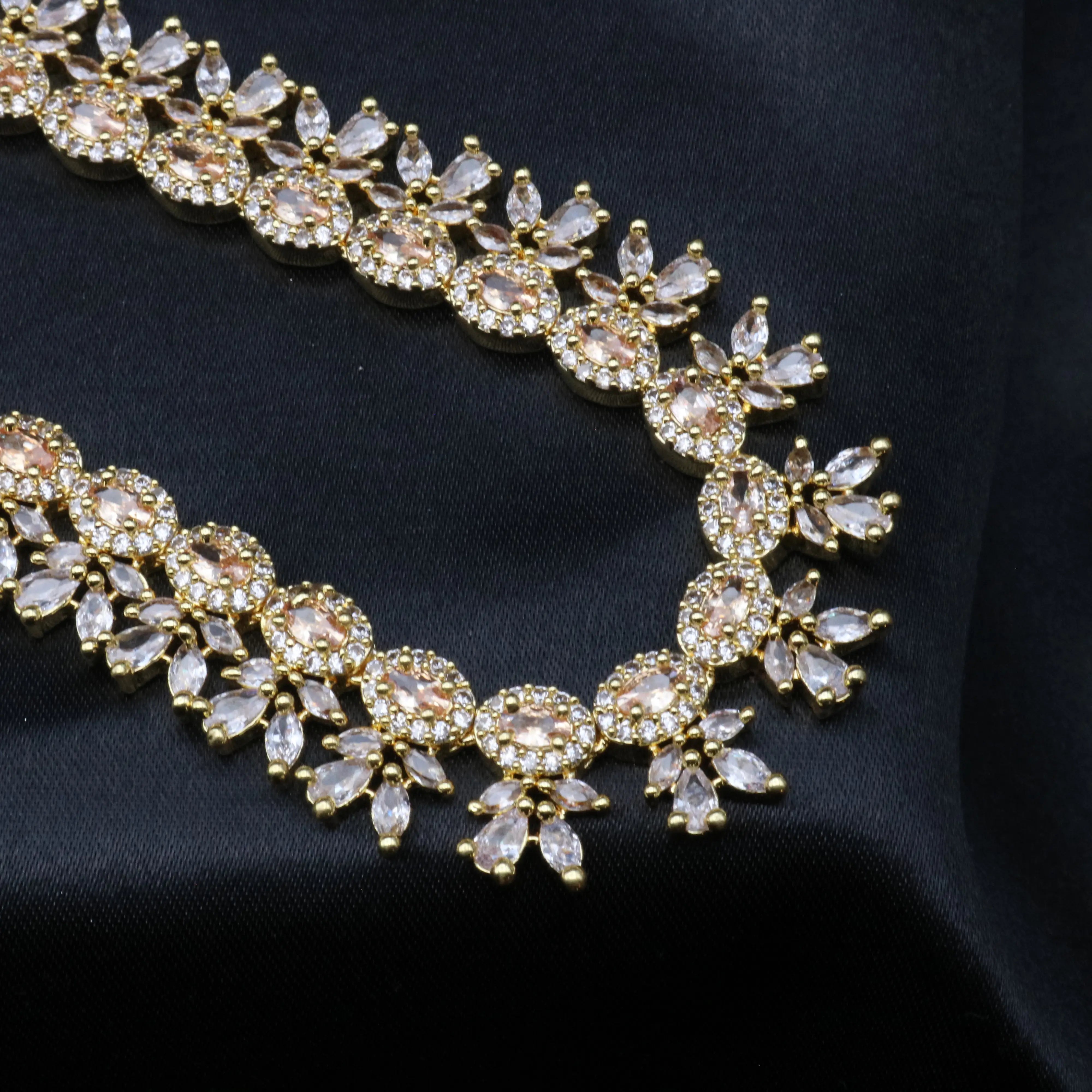 Complete display of the Royalty gold-plated CZ jewelry set with elegant floral craftsmanship