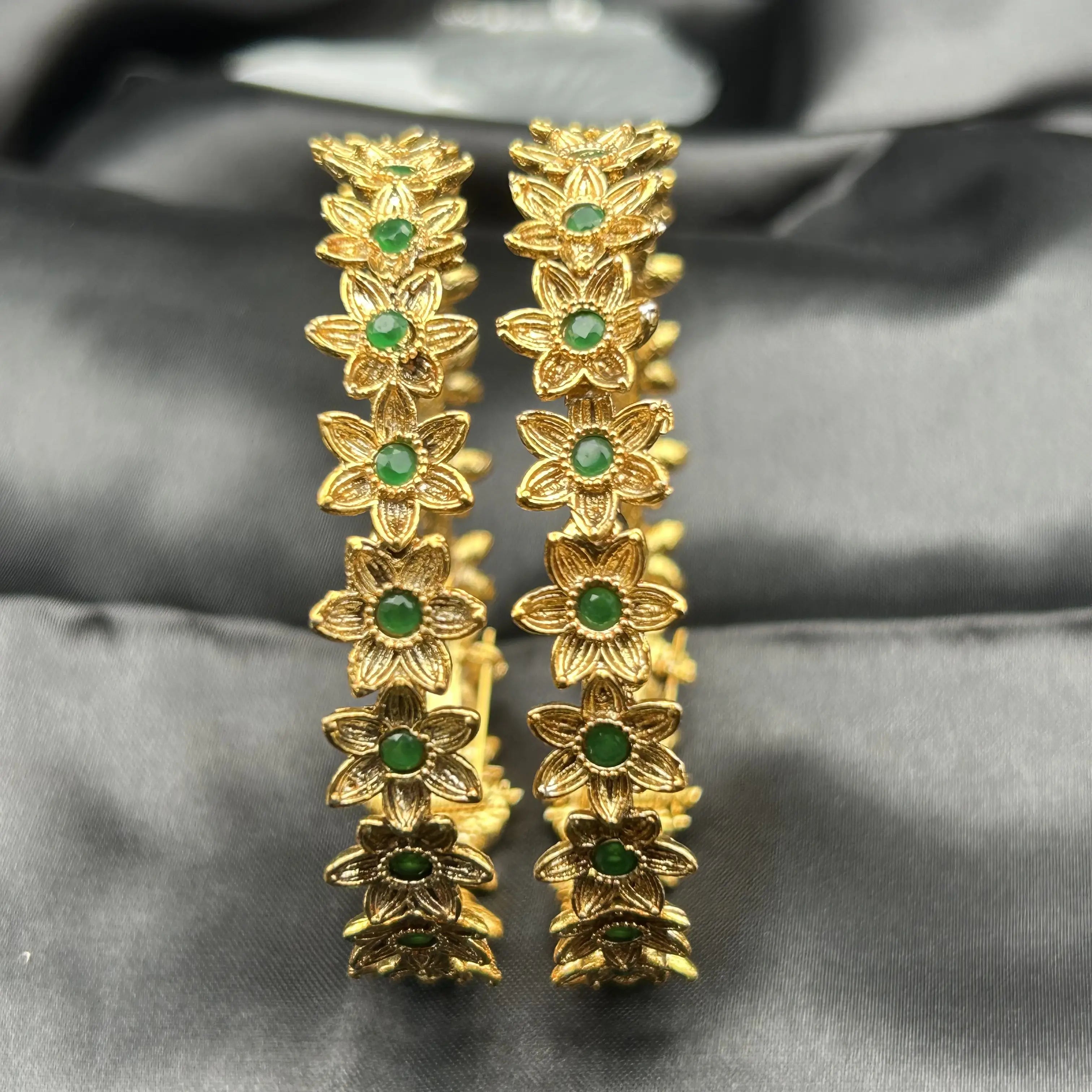 Gold-plated floral openable bangles with green stone accents