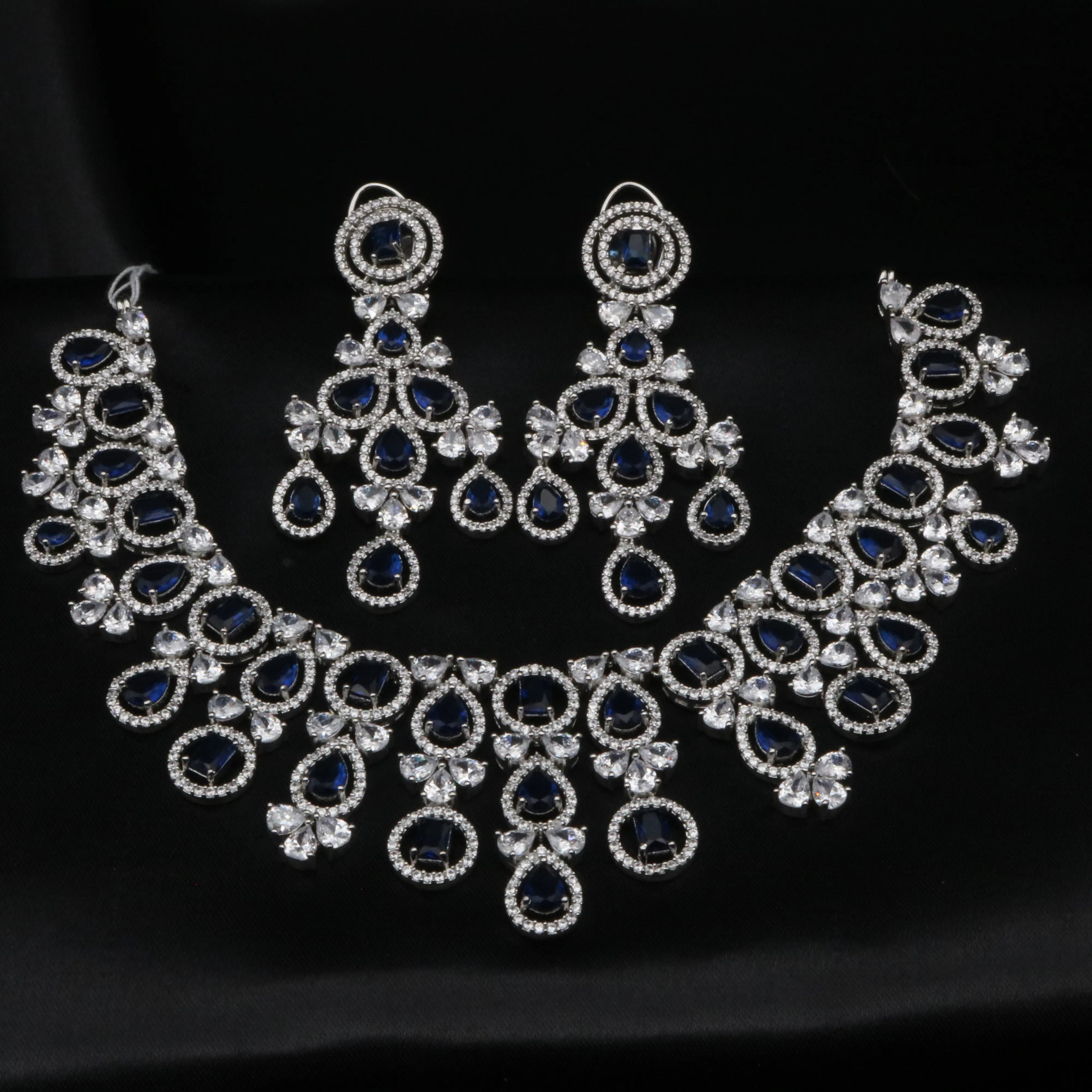 Front-facing display of the Swanlake set with symmetrical royal blue and white CZ design