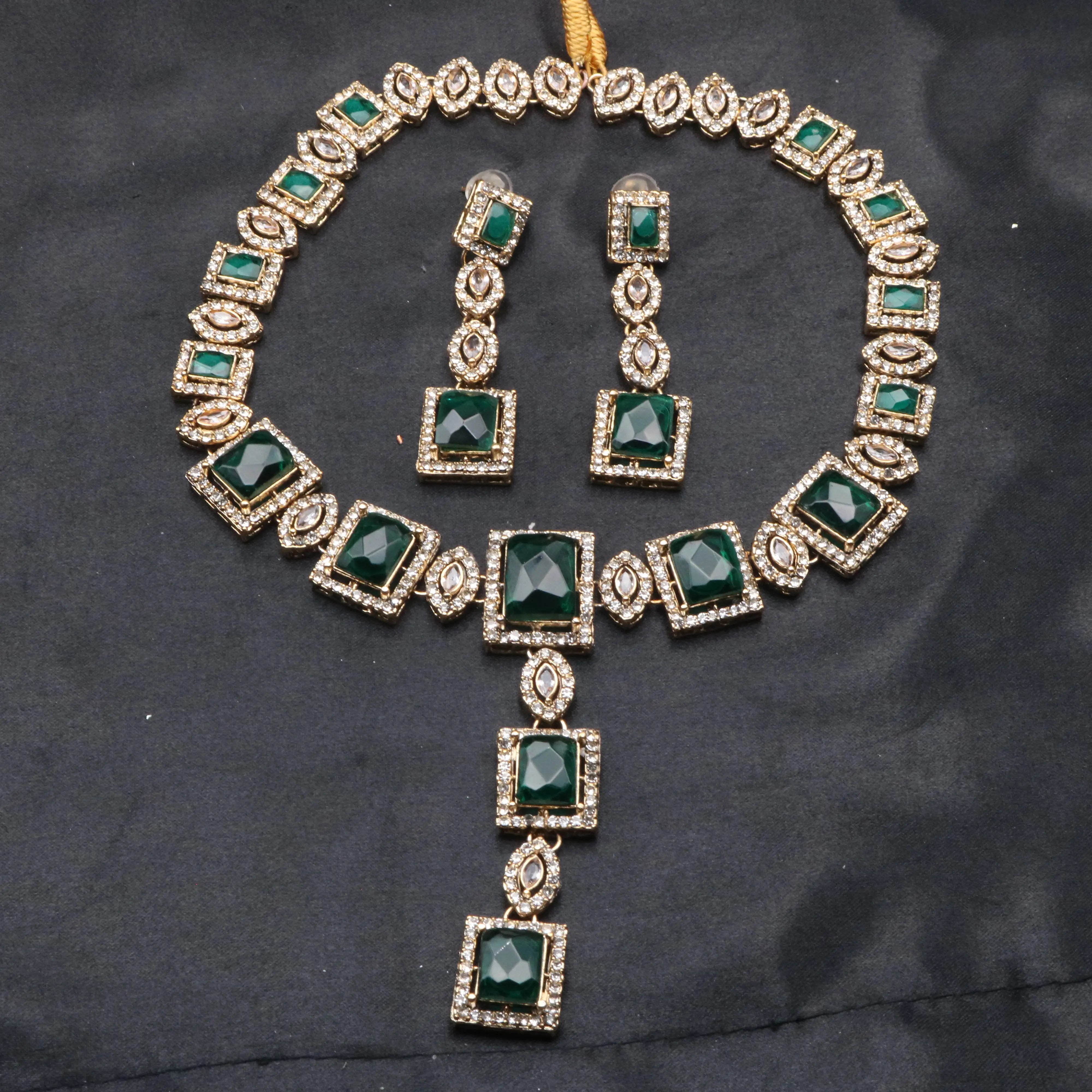 Taj Mahal necklace set in emerald green with gold-plated finish and CZ accents
