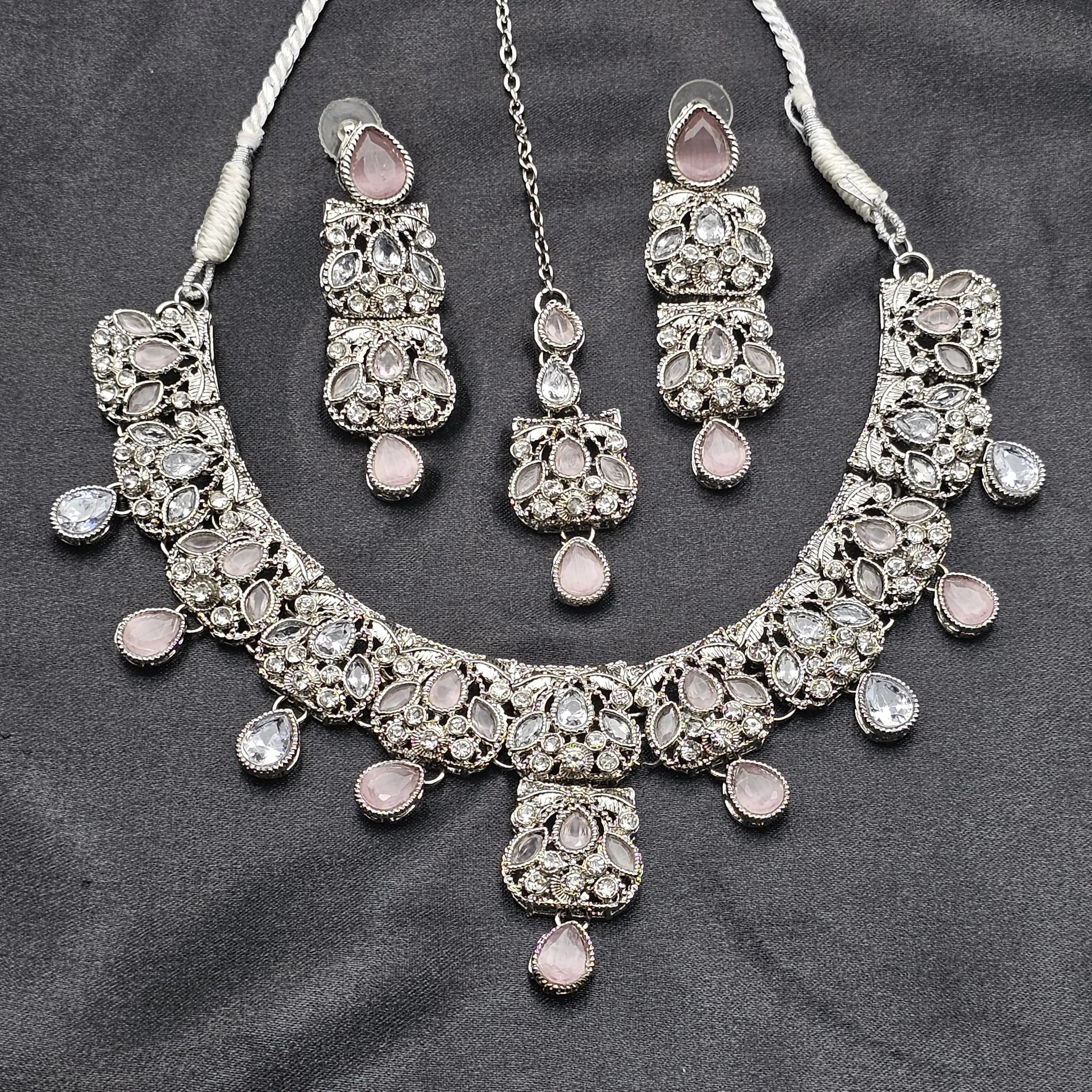Silver-toned Zahra necklace set with pink and clear CZ stones, handcrafted bridal jewelry with teeka