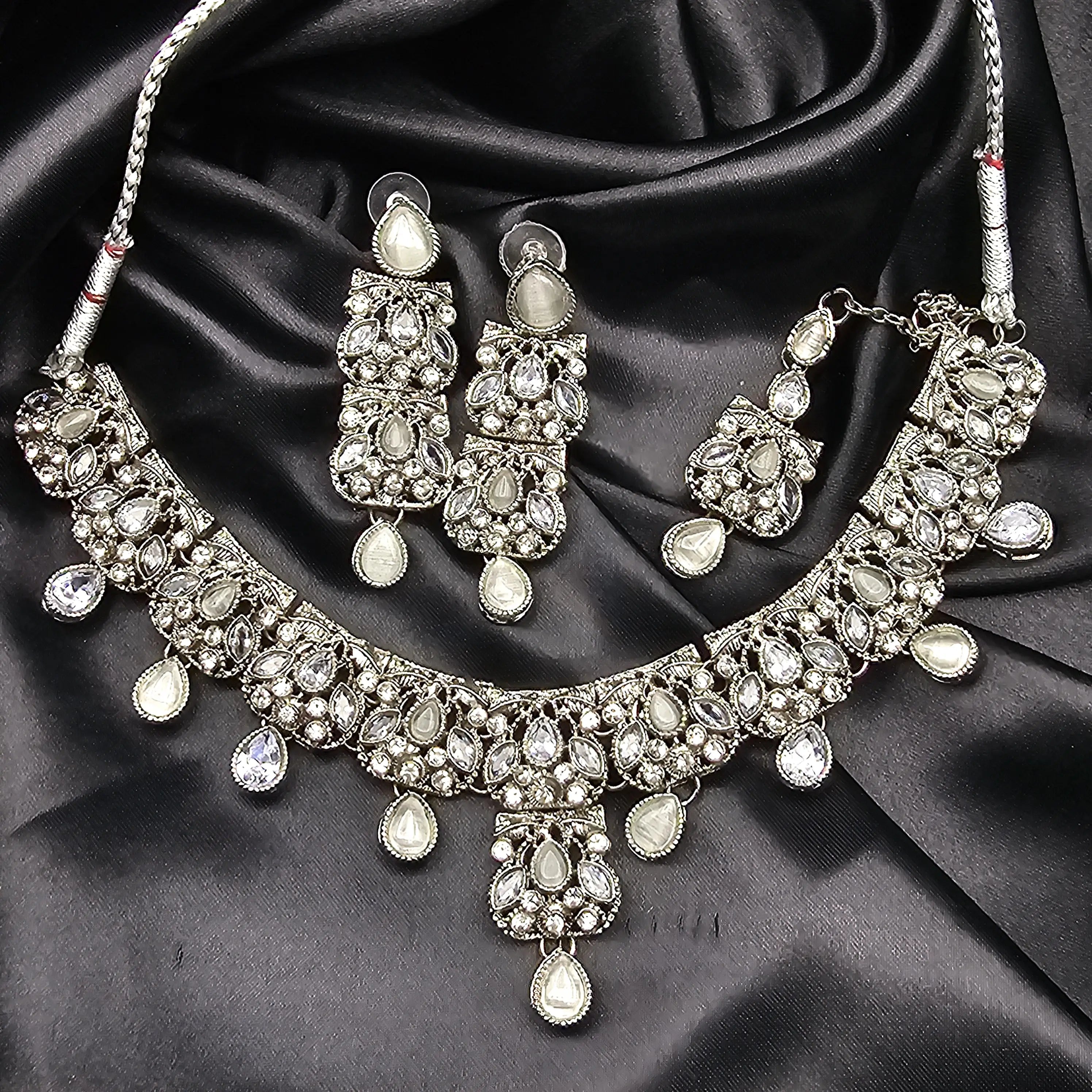 Full silver bridal necklace set Zahra with American diamonds and teardrop accents, teeka and earrings included